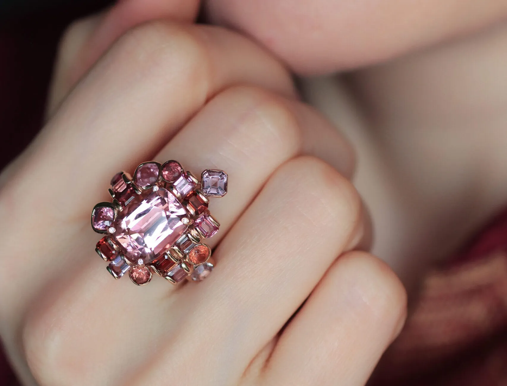 Katerina Perez wears the Zome Jewellery Roselle ring with a 6.7 carat pink tourmaline, 4.5 carats of pink, white and red spinels, and brilliant-cut diamonds in 18k rose gold 