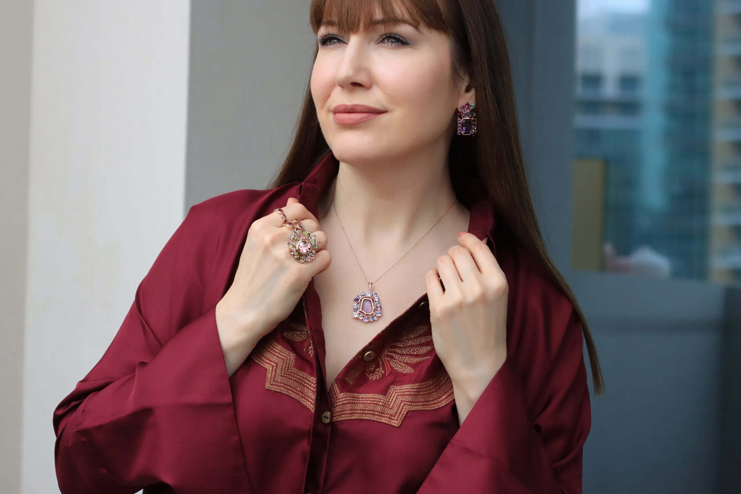 Katerina Perez wears a selection of pieces by Zome Jewellery including the Mystara necklace from the Ametra collection with a 7 carat ‘phantom’ amethyst and multi-coloured sapphires set in 18k rose gold 