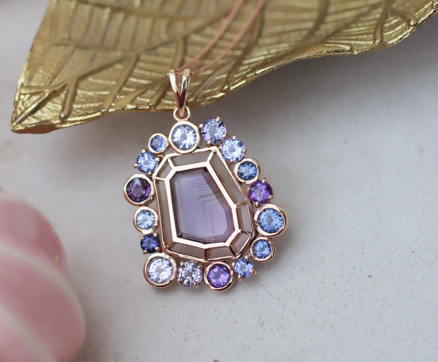 Zome Jewellery Mystara necklace from the Ametra collection with a 7 carat ‘phantom’ amethyst and multi-coloured sapphires set in 18k rose gold 