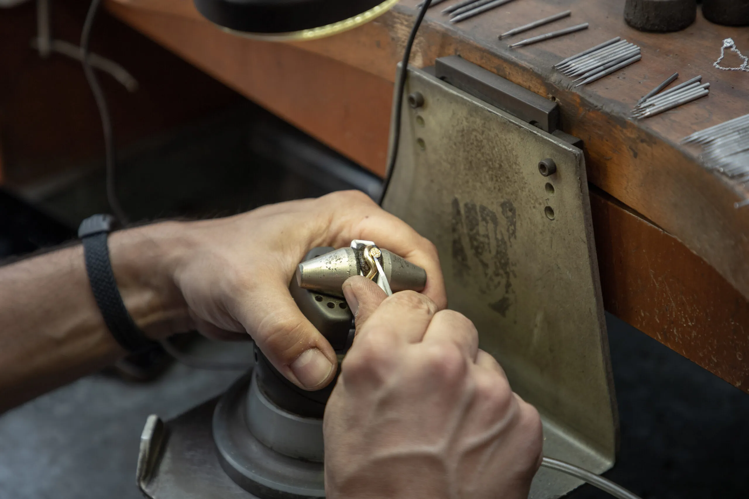 Stone setting at the bench to bring a piece of Dionysios fine jewellery to life 