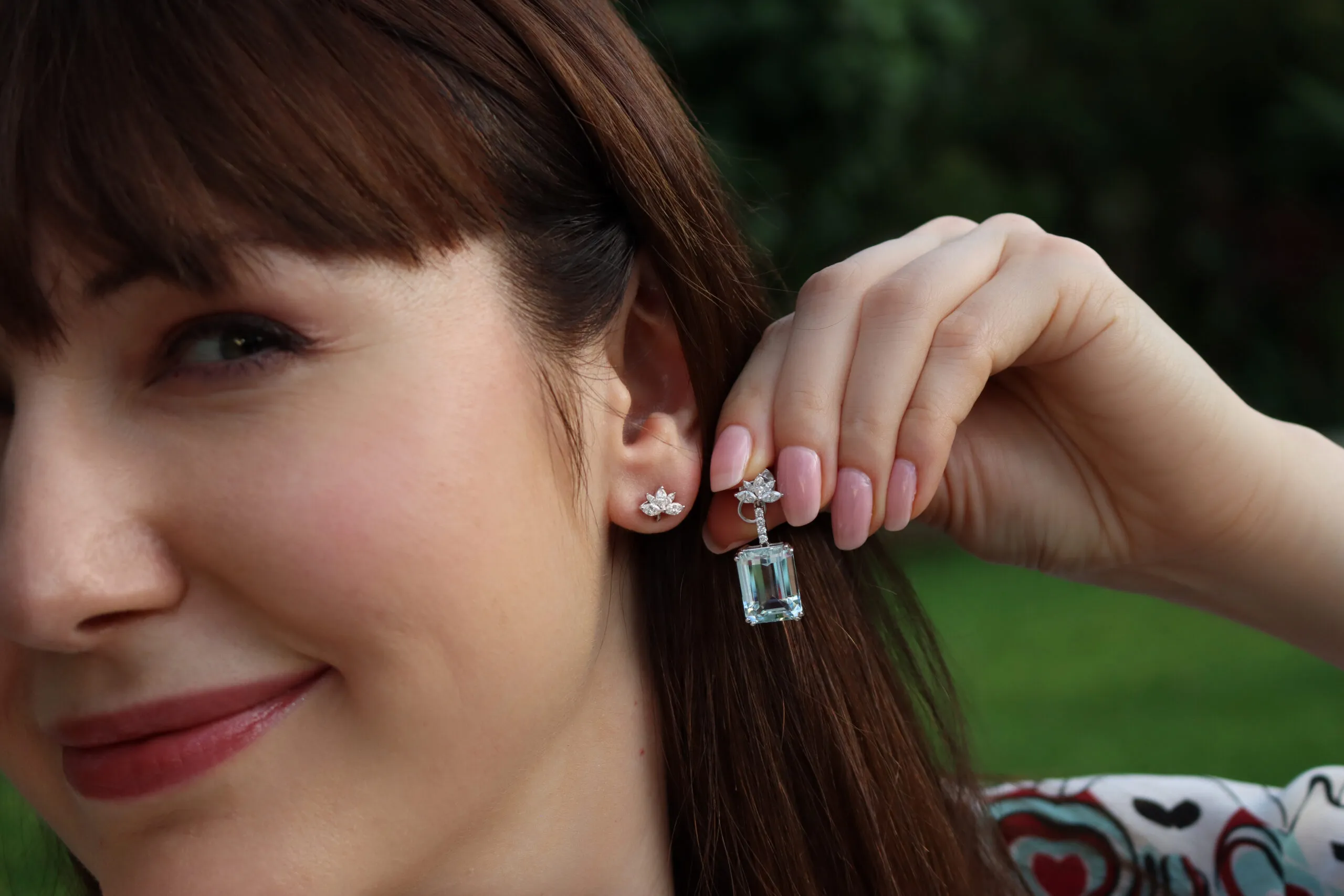 Katerina Perez wears the Valentina Fine Jewellery aquamarine and diamond detachable earrings with 22-carats of sea foam blue aquamarines and 0.98 carats of diamonds, set in 18k white gold
