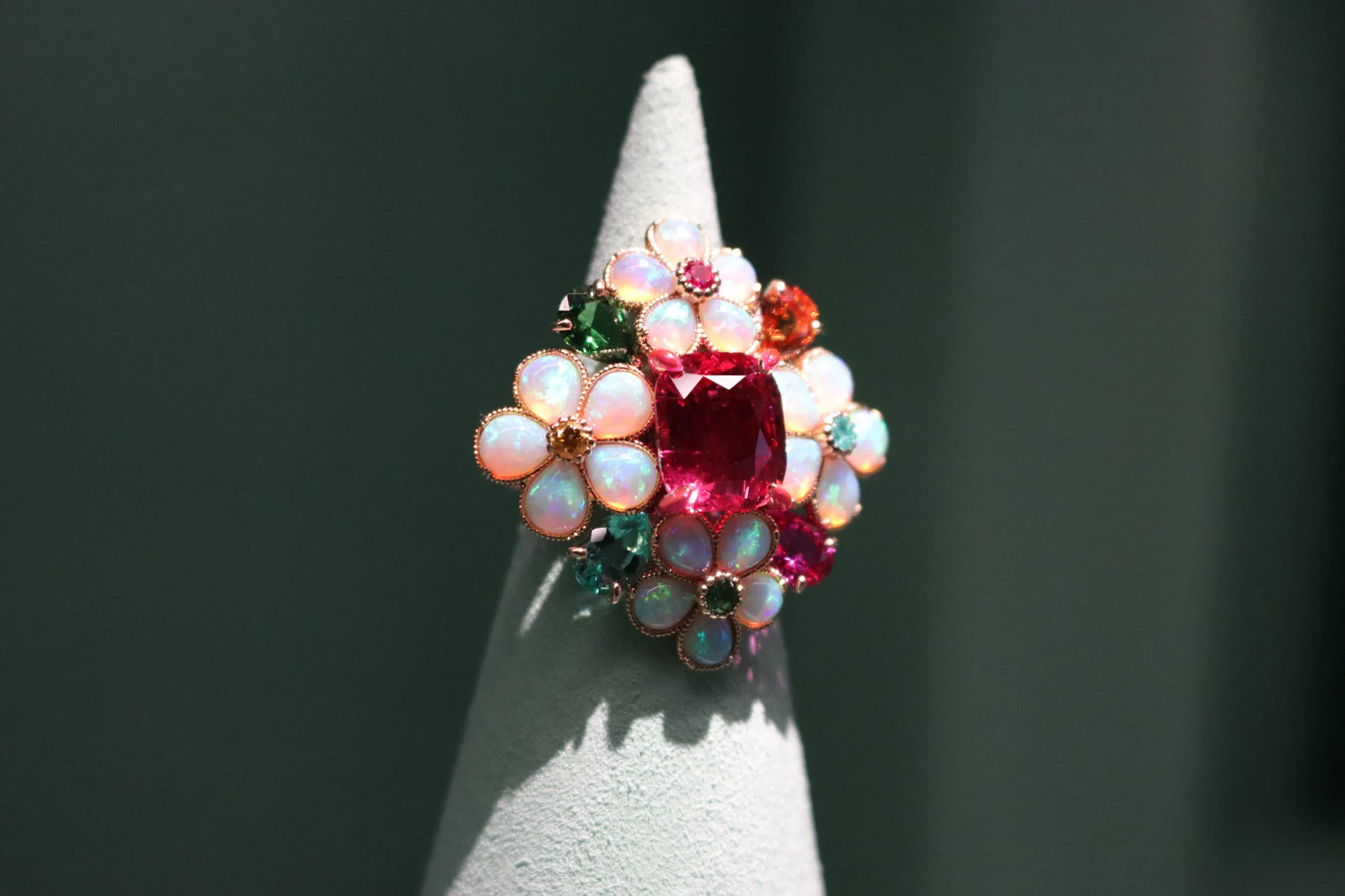 <p>A ring set with a 6.50-carat cushion-cut pink spinel from Tanzania surrounded by pink toned opal cabochons in the Belle Dior High Jewellery collection by Dior Joaillerie</p>