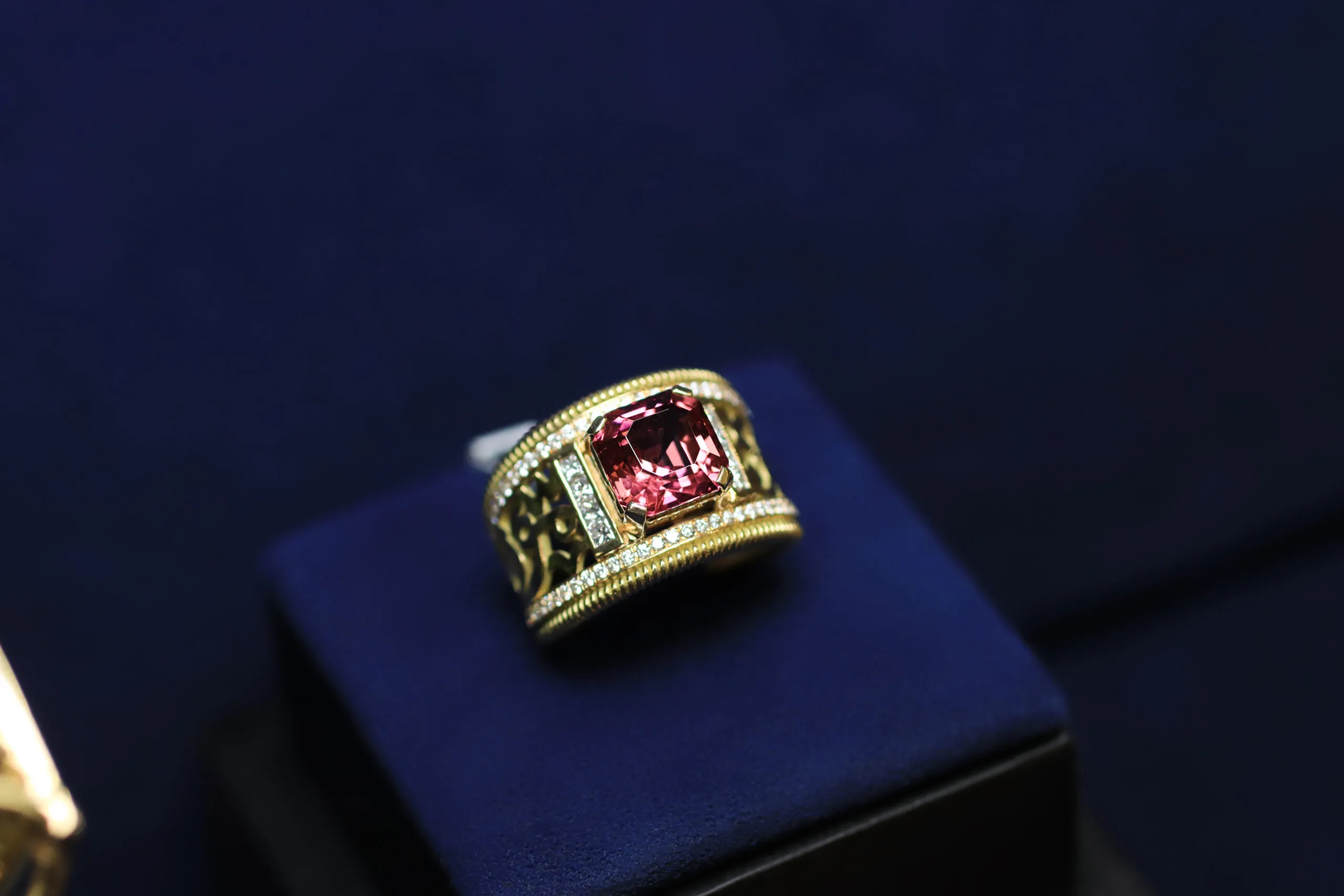 The Azza Fahmy Art Deco Calligraphy ring from the second chapter of the Tales of the Nile High Jewellery collection, set with a 3.97-carat rubellite and diamonds in yellow gold 