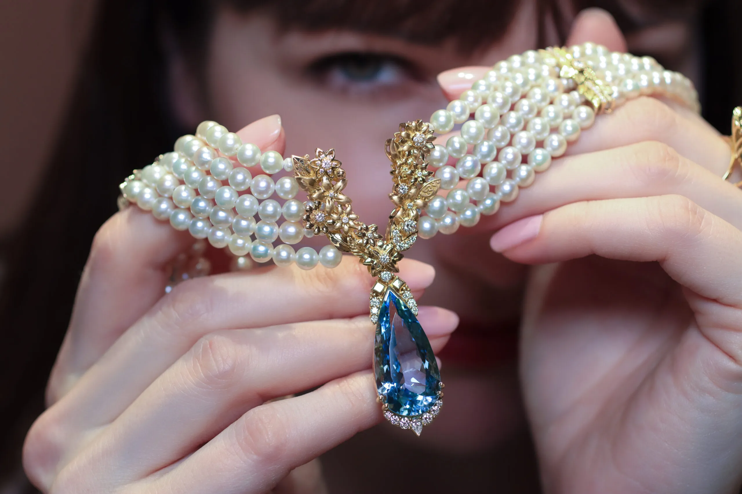 The Azza Fahmy Garden of Light choker from the second chapter of the Tales of the Nile High Jewellery collection features a 17.9-carat pear-cut aquamarine and Japanese Akoya pearls