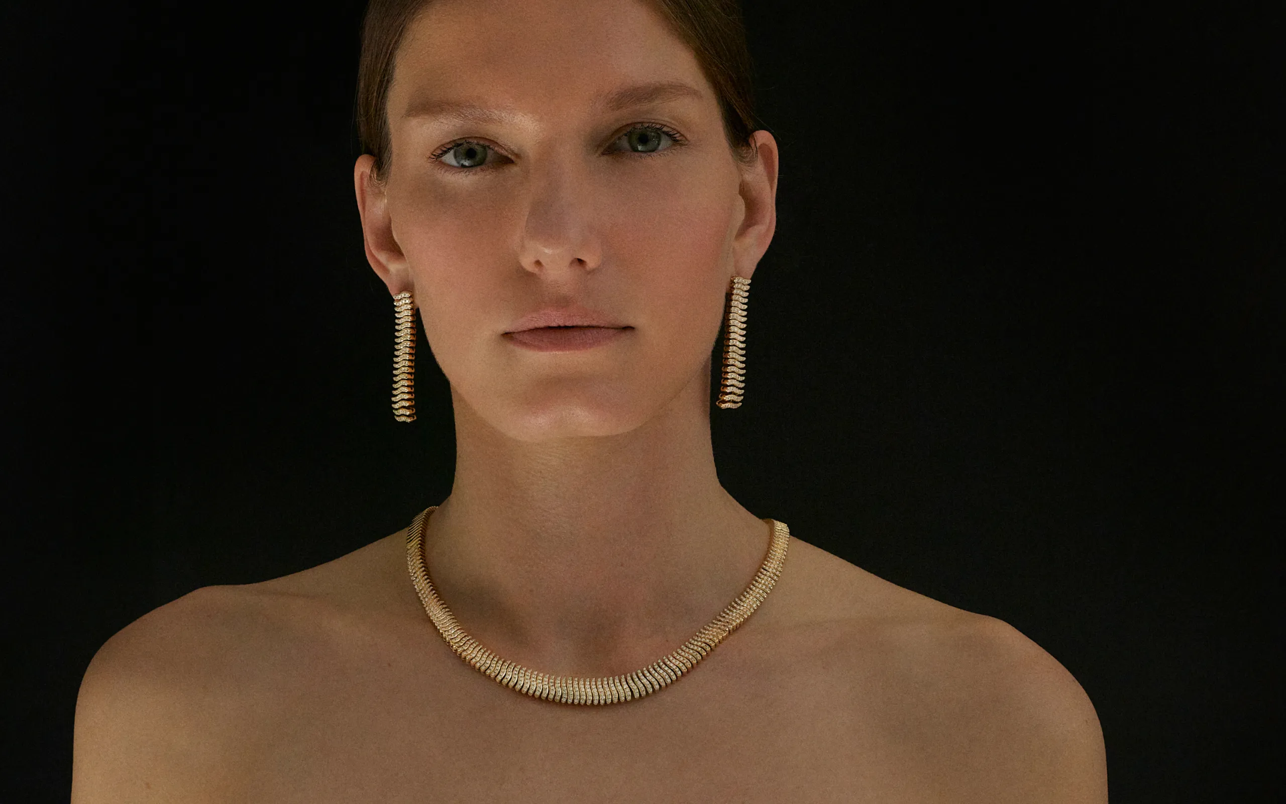 A model wears pieces from the Stephanie collection by Isabel Gemology 