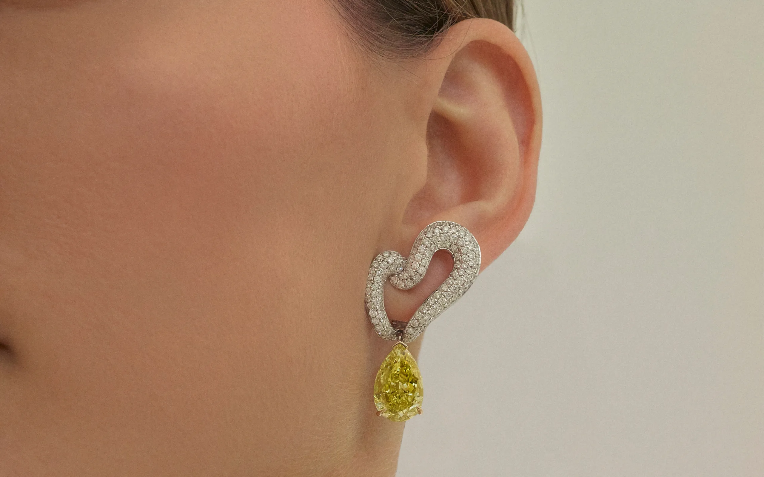 The Maria Twisted earrings by Isabel Gemology can be worn with or without a gemstone drop and are available in 14k white, yellow and rose gold 