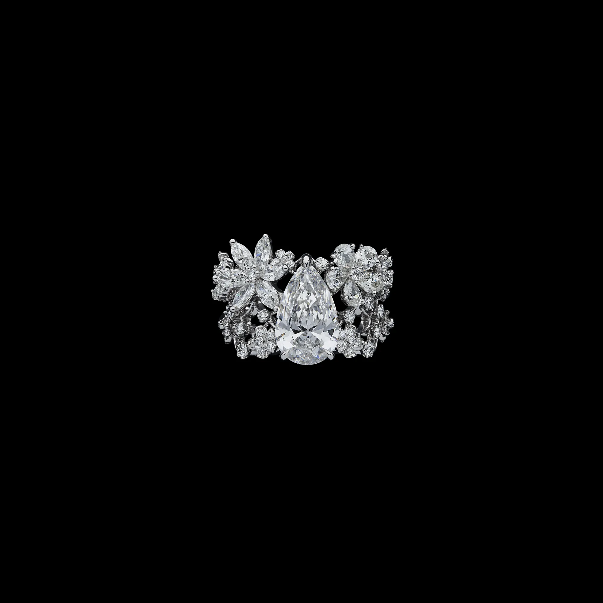 A floral inspired ring with a large pear-shaped diamond and further fancy-cut diamonds from the Dior Milly Dentelle High Jewellery collection