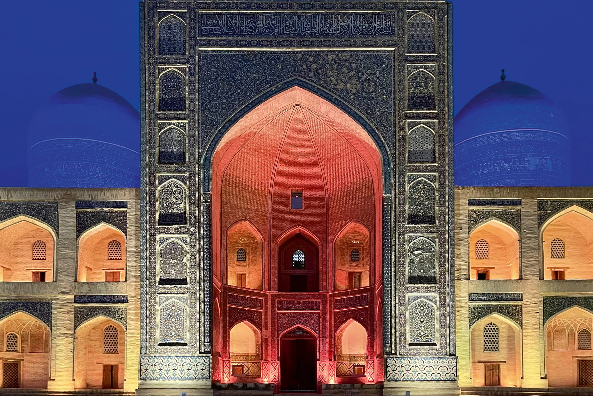 <p>The façade of Mir-i Arab Madrasa in Bukhara, Uzbekistan, at night. Silvia’s Silk Road Collection was inspired by her month-long trek across the country</p>