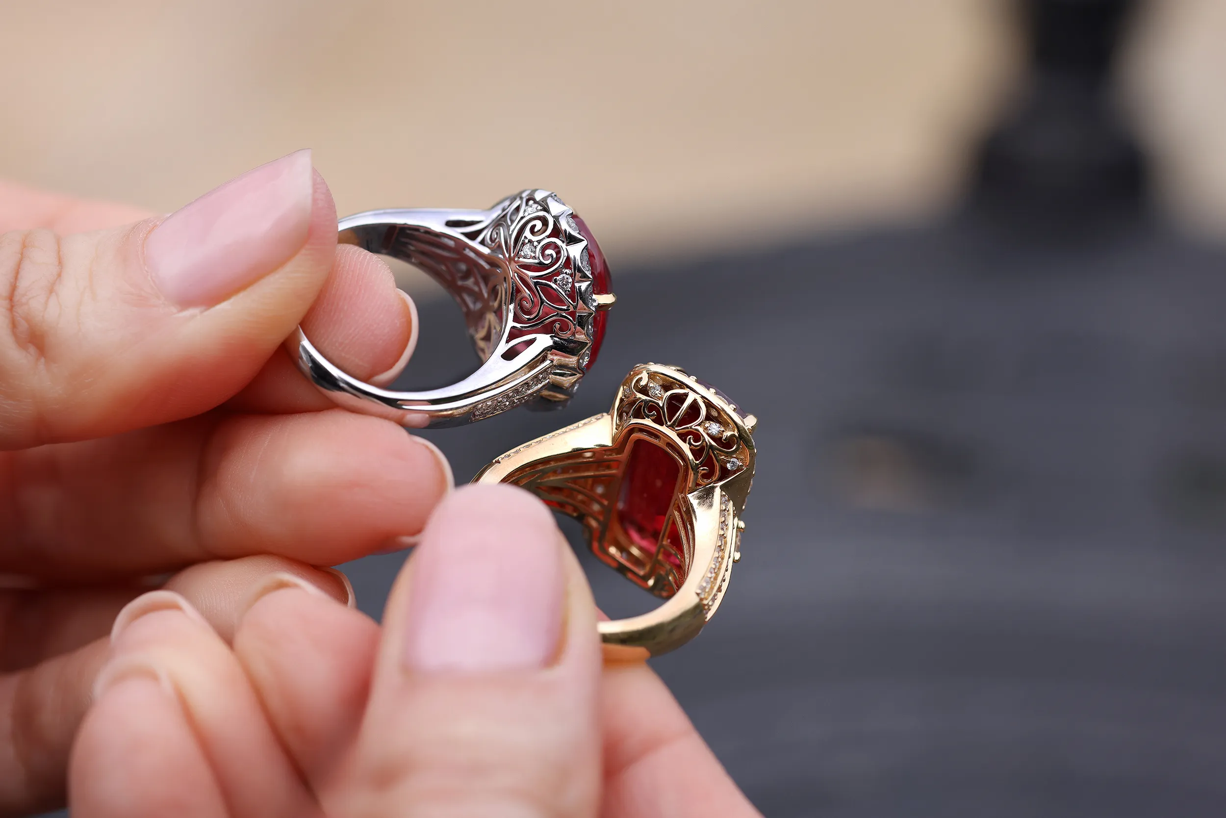 <p>Turn the rings over and a hidden detail emerges: finely crafted decorative baskets</p>