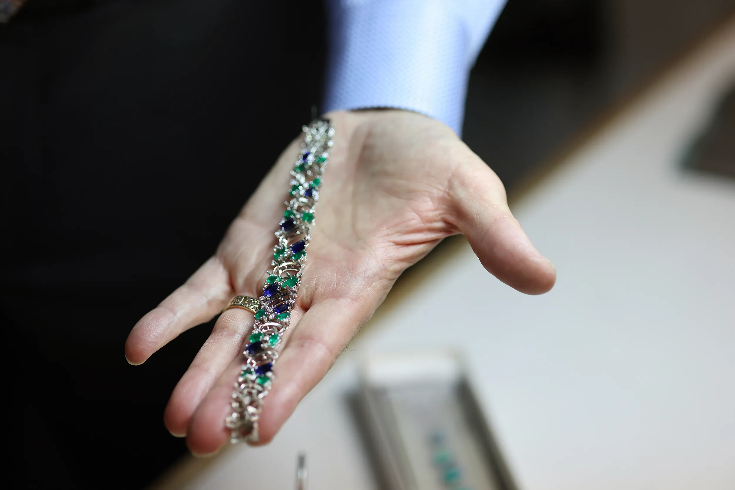 <p>A peek at the progress of the Australian black opal, emerald and sapphire scatter bracelet. Next step: setting 10 black opals totalling 31 carats</p>
