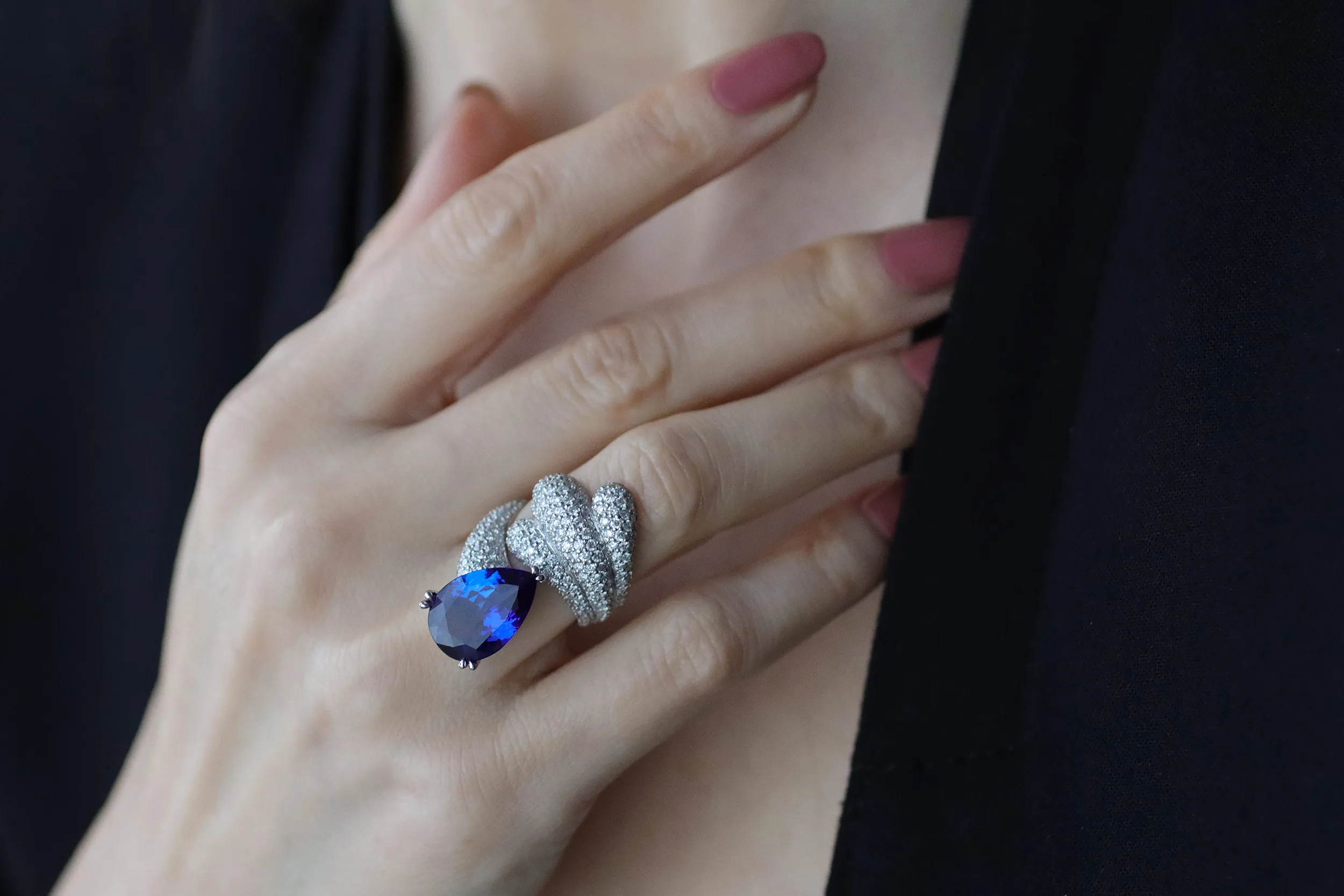 <p>The second Lumen of Grace ring in 18k white gold, <span class="TextRun BCX0 SCXP150548781" lang="EN-US" xml:lang="EN-US" data-scheme-color="@000000,," data-usefontface="true" data-contrast="none"><span class="NormalTextRun BCX0 SCXP150548781">set with white </span></span><span class="TextRun BCX0 SCXP150548781" lang="EN-US" xml:lang="EN-US" data-scheme-color="@000000,," data-usefontface="true" data-contrast="none"><span class="NormalTextRun BCX0 SCXP150548781">diamonds totalling 7 carats and</span></span> <span class="TextRun BCX0 SCXP150548781" lang="EN-US" xml:lang="EN-US" data-scheme-color="@000000,," data-usefontface="true" data-contrast="none"><span class="NormalTextRun BCX0 SCXP150548781">a rare pear shape tanzanite of </span></span><span class="TextRun BCX0 SCXP150548781" lang="EN-US" xml:lang="EN-US" data-scheme-color="@000000,," data-usefontface="true" data-contrast="none"><span class="NormalTextRun BCX0 SCXP150548781">around 8 carats</span></span></p>