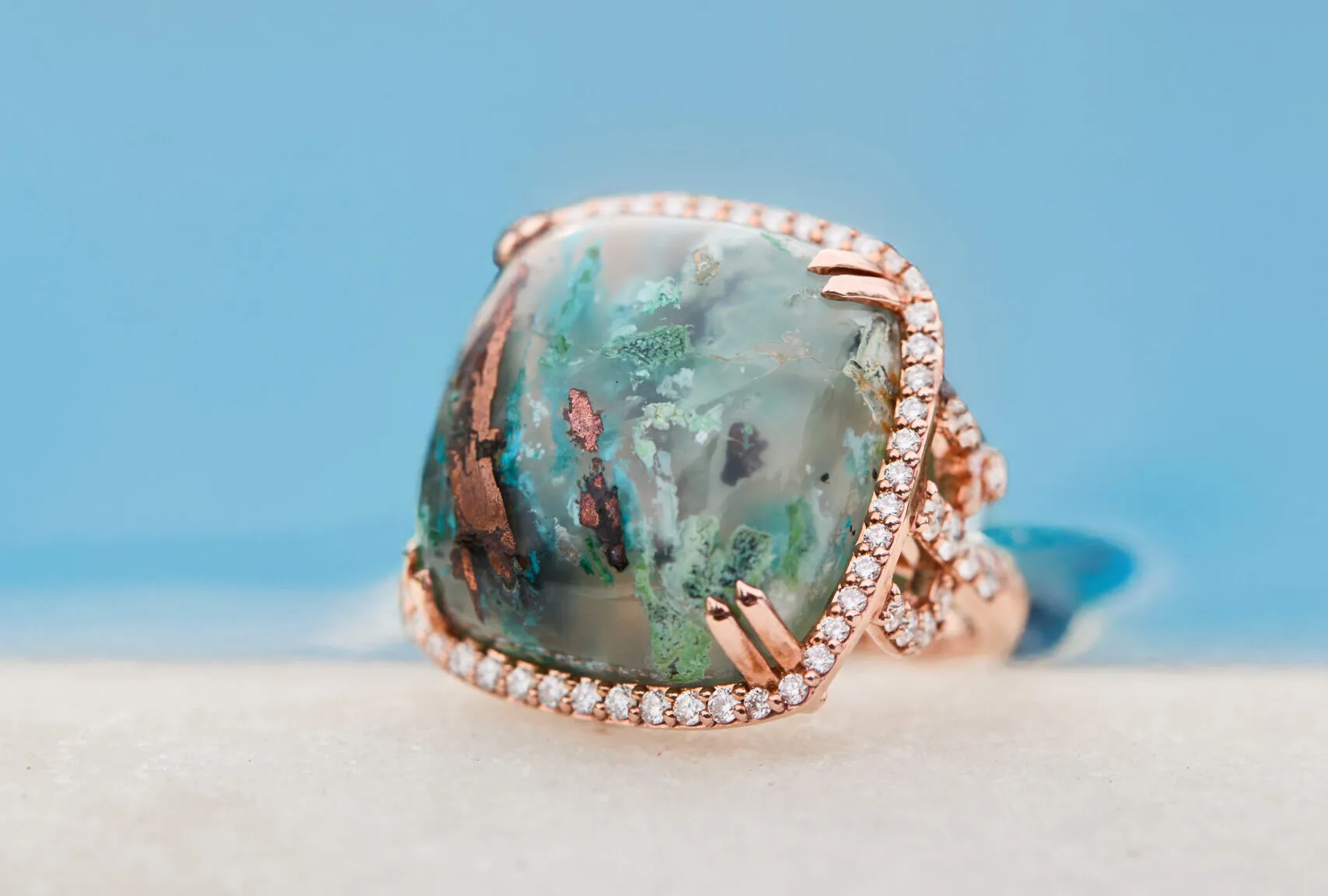Le Vian Couture® Quince ring with a 31.01 carat cushion-shaped Aquadite® surrounded by Vanilla Diamonds® in 18k Strawberry Gold®
