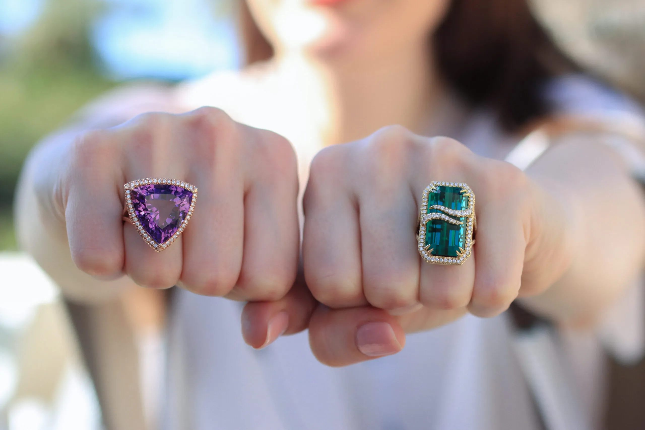 Lisa Nik cocktail rings from the Colors collection, including an indicolite tourmaline with a 'double wave' of pavé diamonds that stretch across the top of the stone