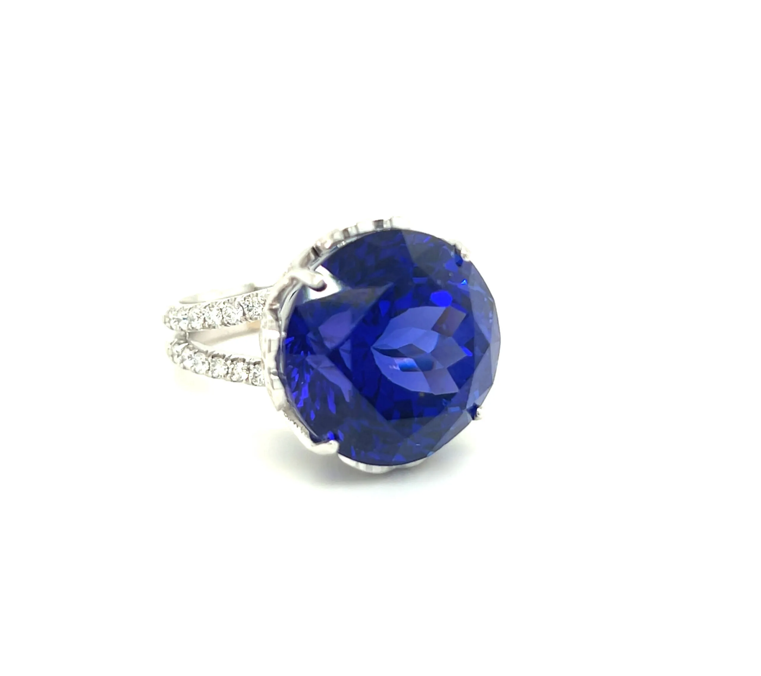 A large tanzanite cocktail ring by Lisa Nik with diamond-set split shoulder detailing 