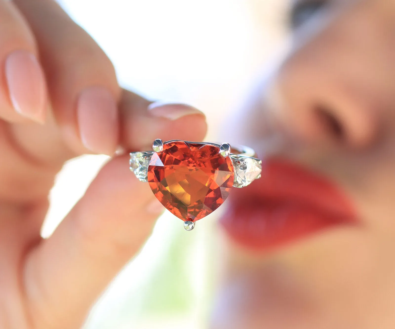 Lisa Nik 20-carat heart-shaped mandarin garnet ring with two pear-shaped diamond accents, set in 18k gold 