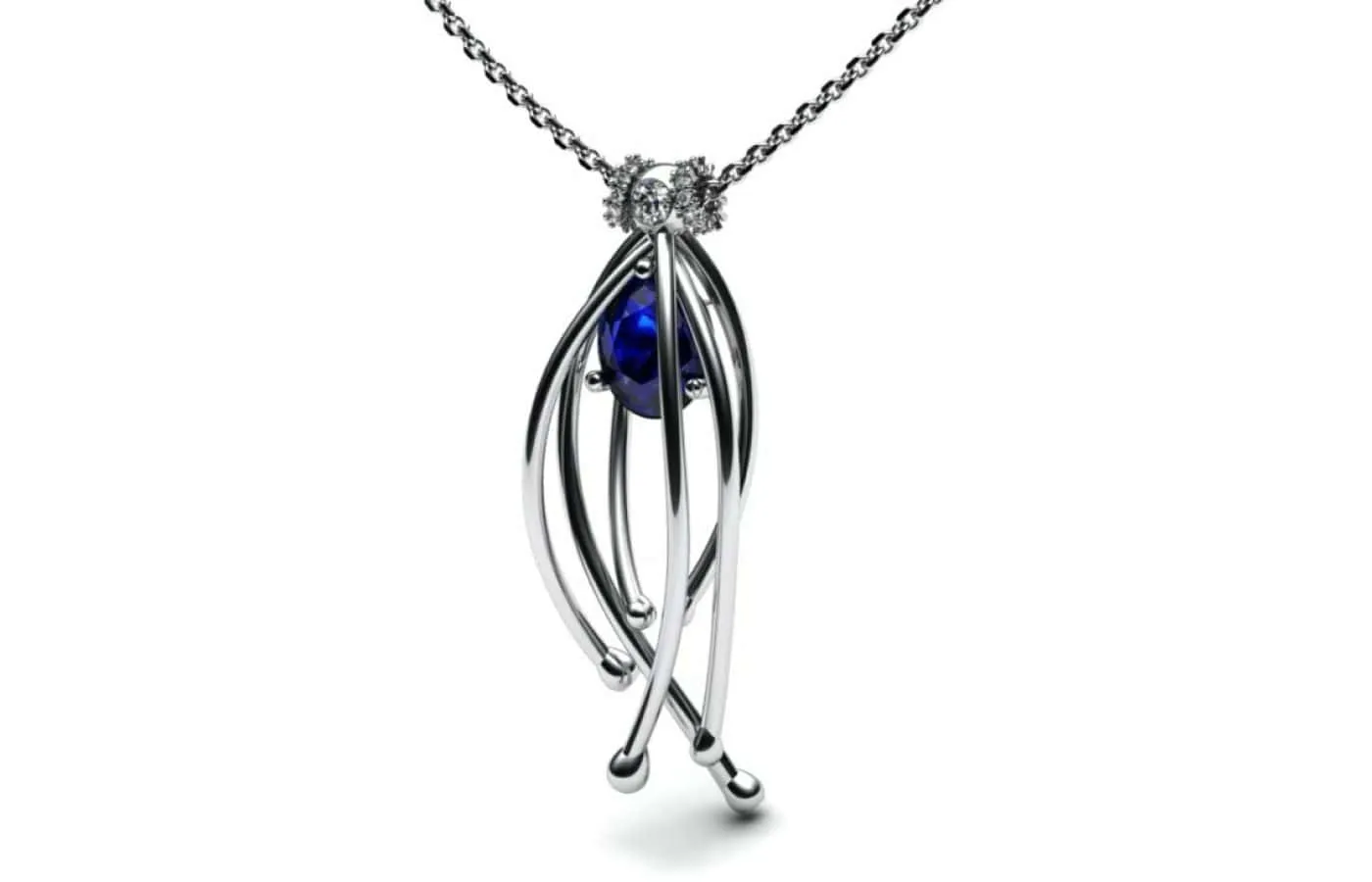 Korbička Šperky pendant in 18k white gold with a natural deep blue oval-shaped sapphire