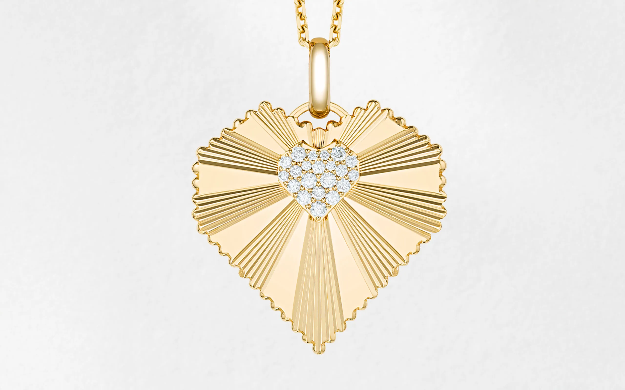 Marceline Paris Large Heart of the World necklace from the Love Frequency collection, crafted with diamonds in 18k yellow gold 