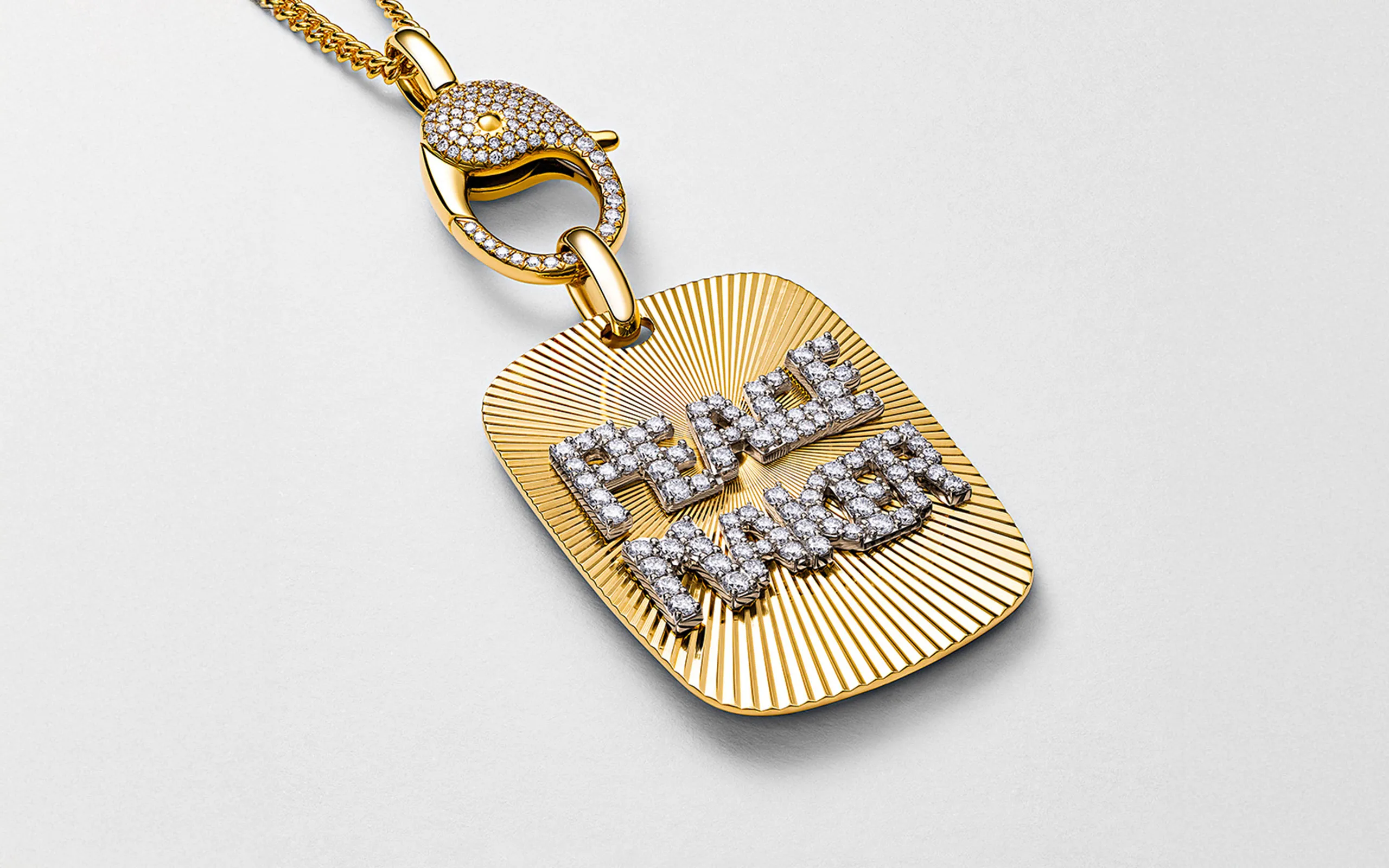 Marceline Paris Peace Maker Tag necklace from the Wisdom Graffiti collection with diamonds in 18k yellow gold 