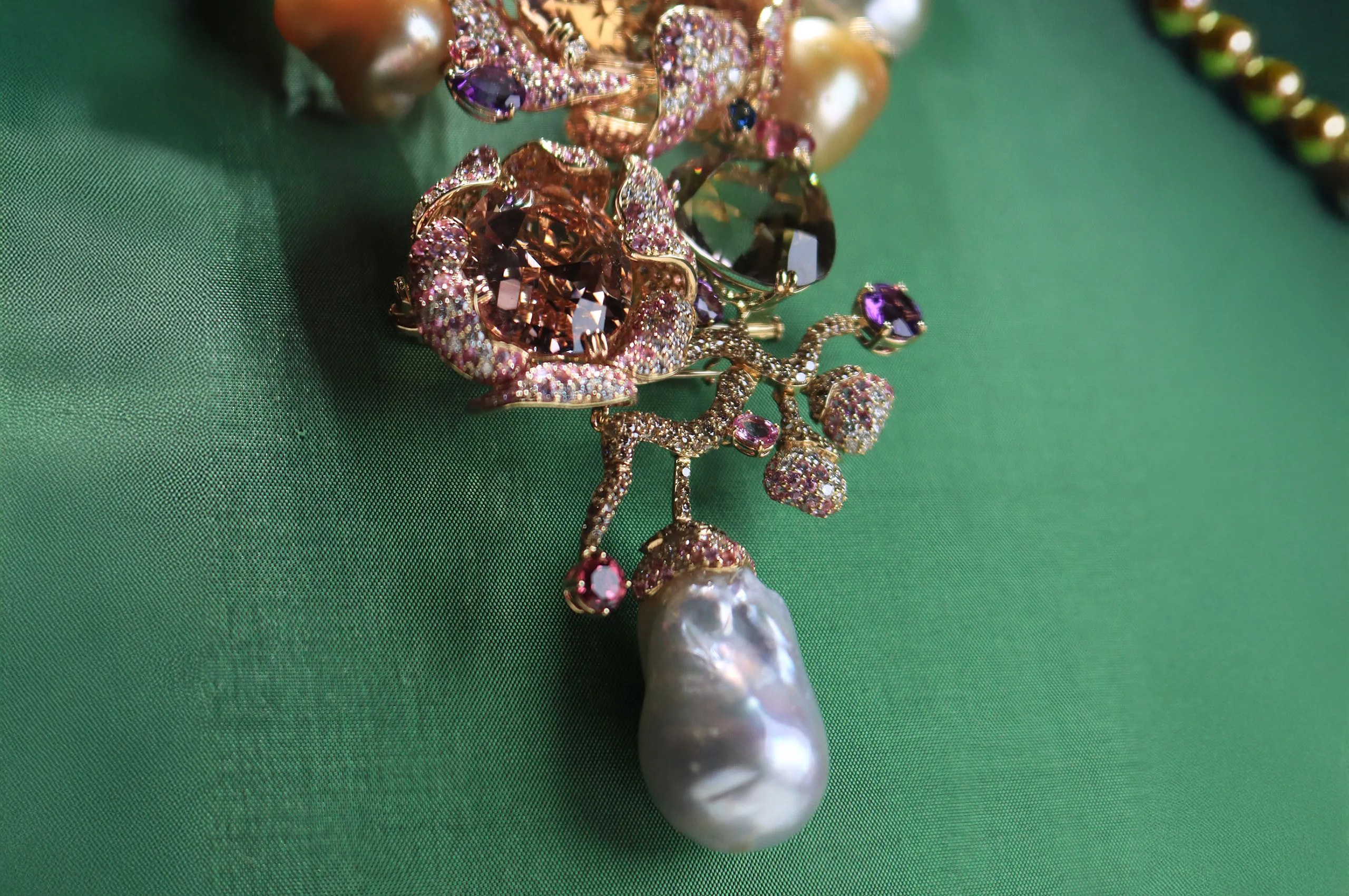 A rare Australian South Sea baroque pearl drop measuring 21x32mm sits below the hero tourmalines in the Margot McKinney Bloem collier, one of a series of masterpieces presented at TEFAF Maastricht 2025