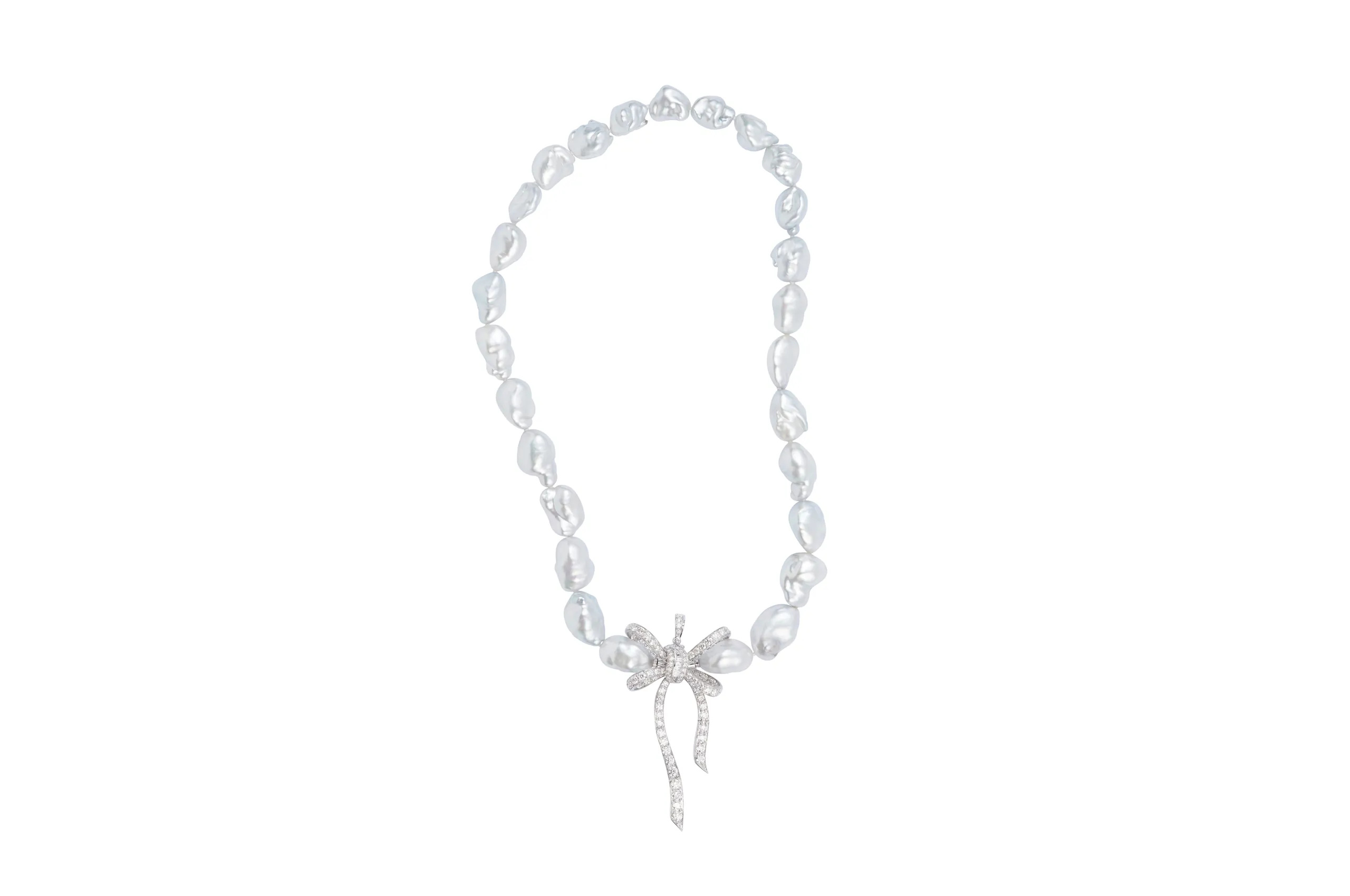 Margot McKinney Bow pendant with diamonds in 18k white gold, shown here with a necklace of Australian South Sea baroque pearls