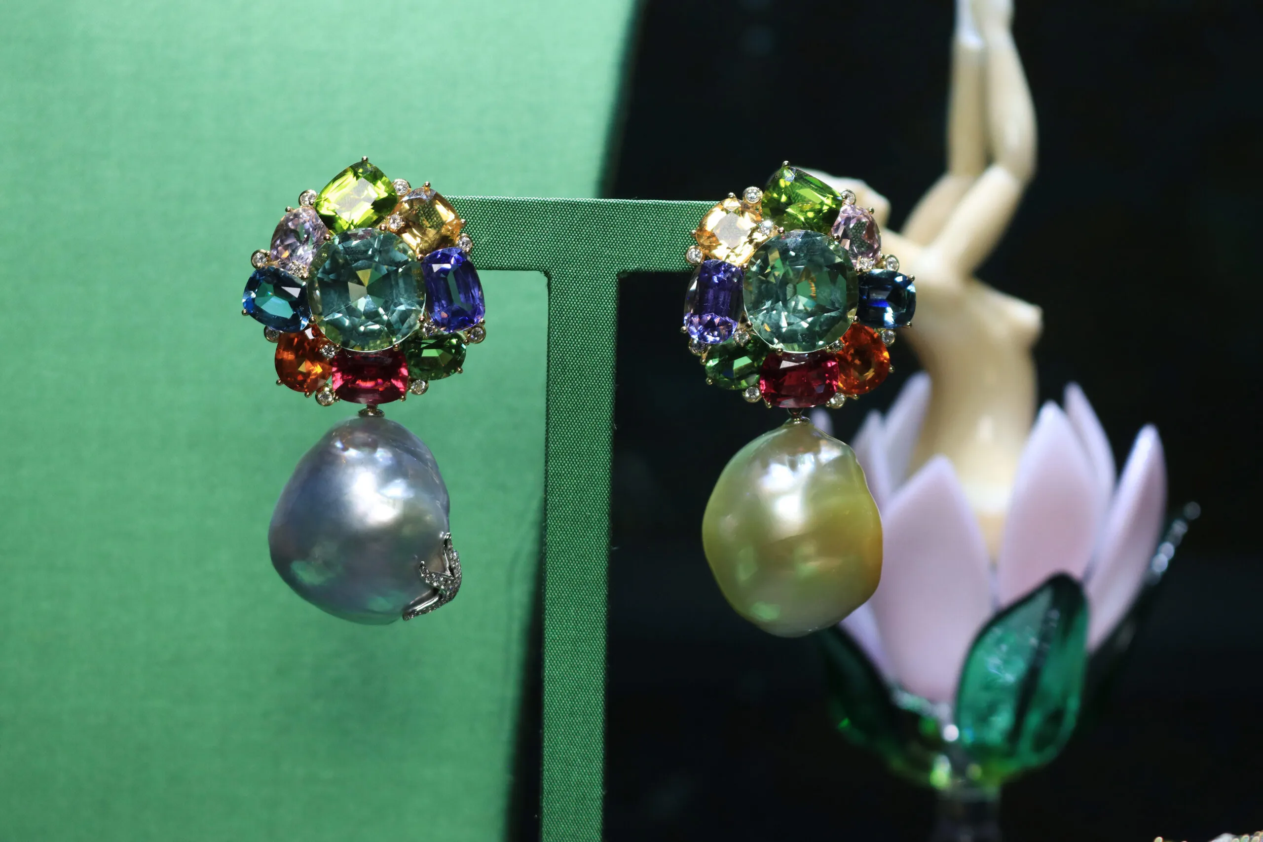 Margot McKinney Lorikeet earrings with 40.84 carats of green tourmalines, Australian South Sea baroque pearls, peridots, kunzites, yellow beryls, aquamarines, tanzanites, mandarin garnets, green tourmalines, rubellites and diamonds, set in 18k yellow and white gold 
