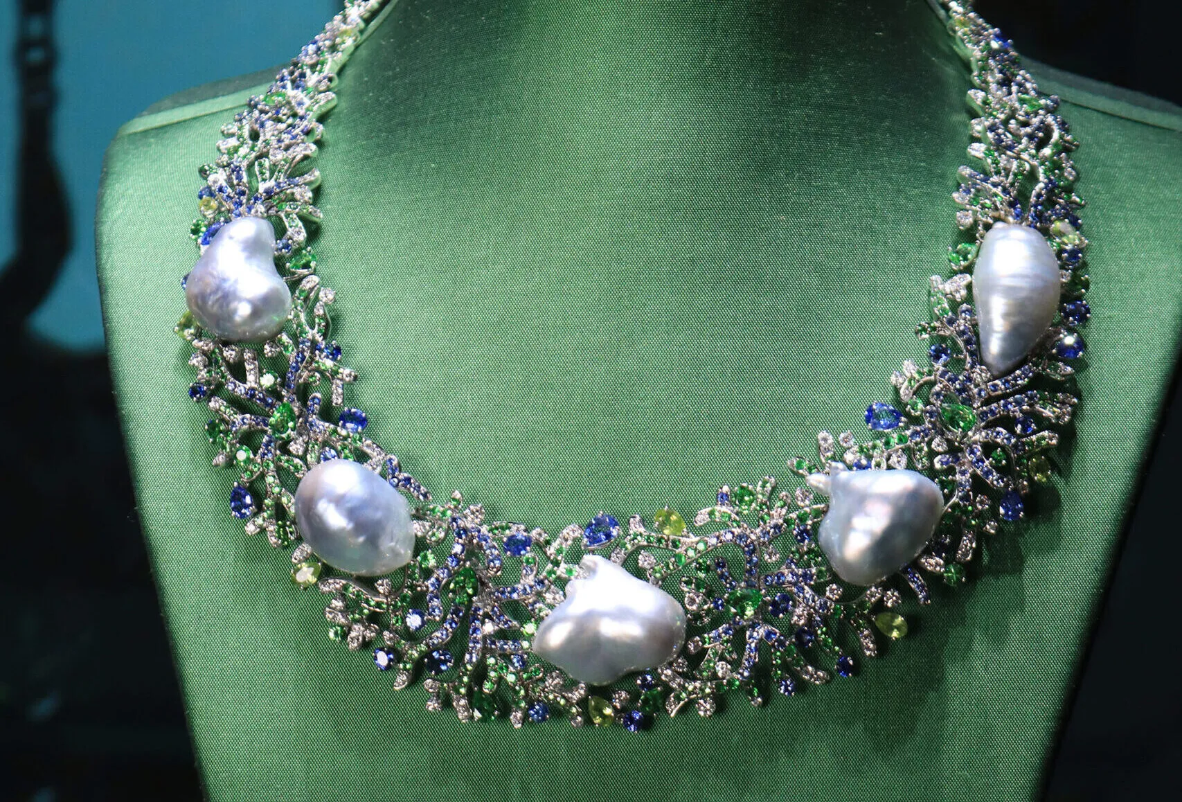 Margot McKinney Coral collier with Australian South Sea baroque pearls, diamonds, blue sapphires, tsavorites and peridots, set in 18k white gold