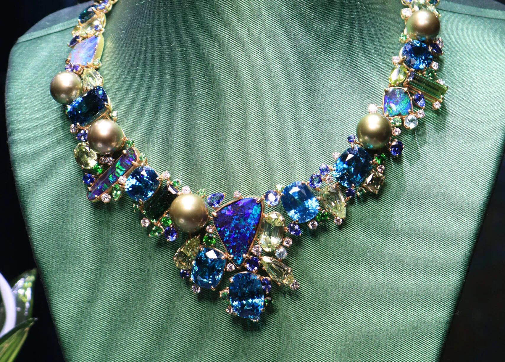 Margot McKinney Cascade collier with 38.35 carats of Australian boulder opals, pistachio pearls, diamonds, blue zircons, yellow beryls, Paraiba tourmalines, demantoids, green tourmalines, blue sapphires, tanzanites, tsavorites and peridots, set in 18k yellow gold 