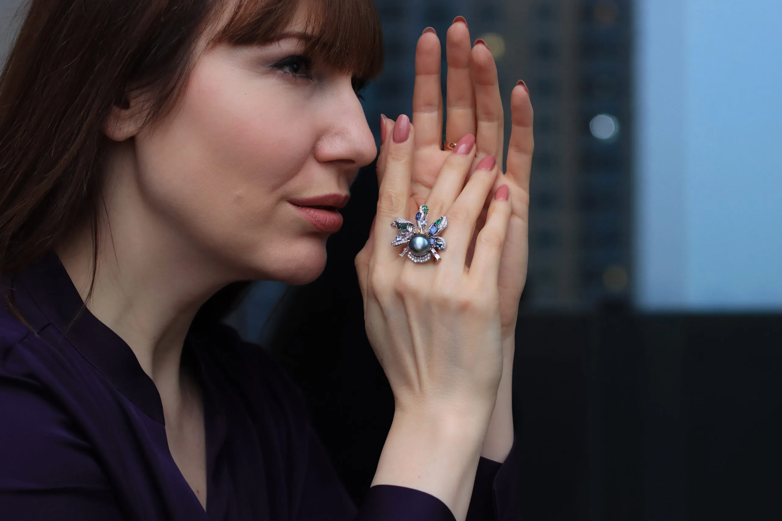 Katerina Perez wears the Mariyeh Ghelichkhani Aqua ring from The Orchid collection with a Tahitian pearl, tourmalines, emeralds, sapphires, tanzanites and diamonds, set in 18k white gold 