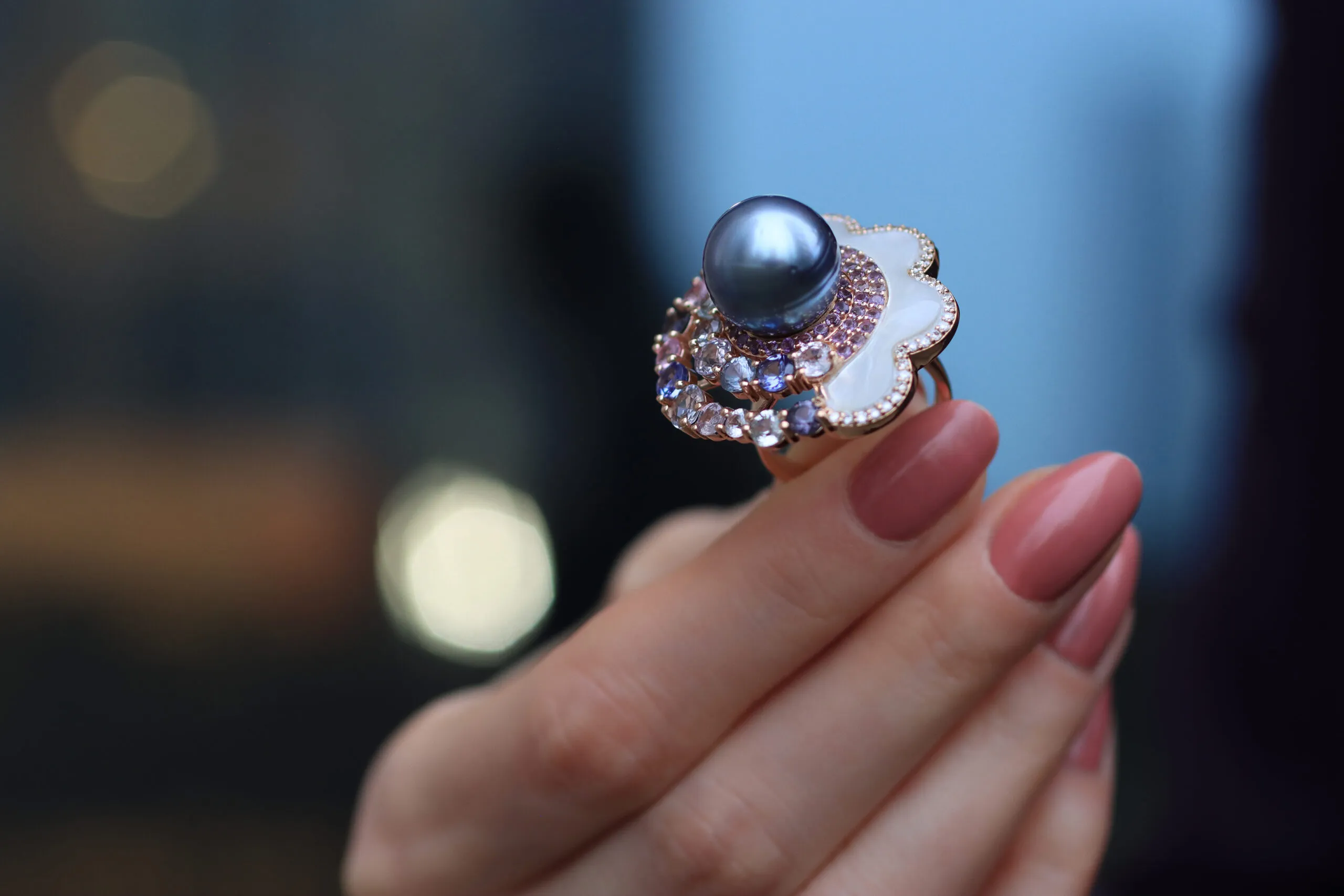 Mariyeh Ghelichkhani Passing Cloud ring with a Tahitian pearl, mother of pearl, diamonds and pastel-coloured sapphires set in 18k yellow gold 