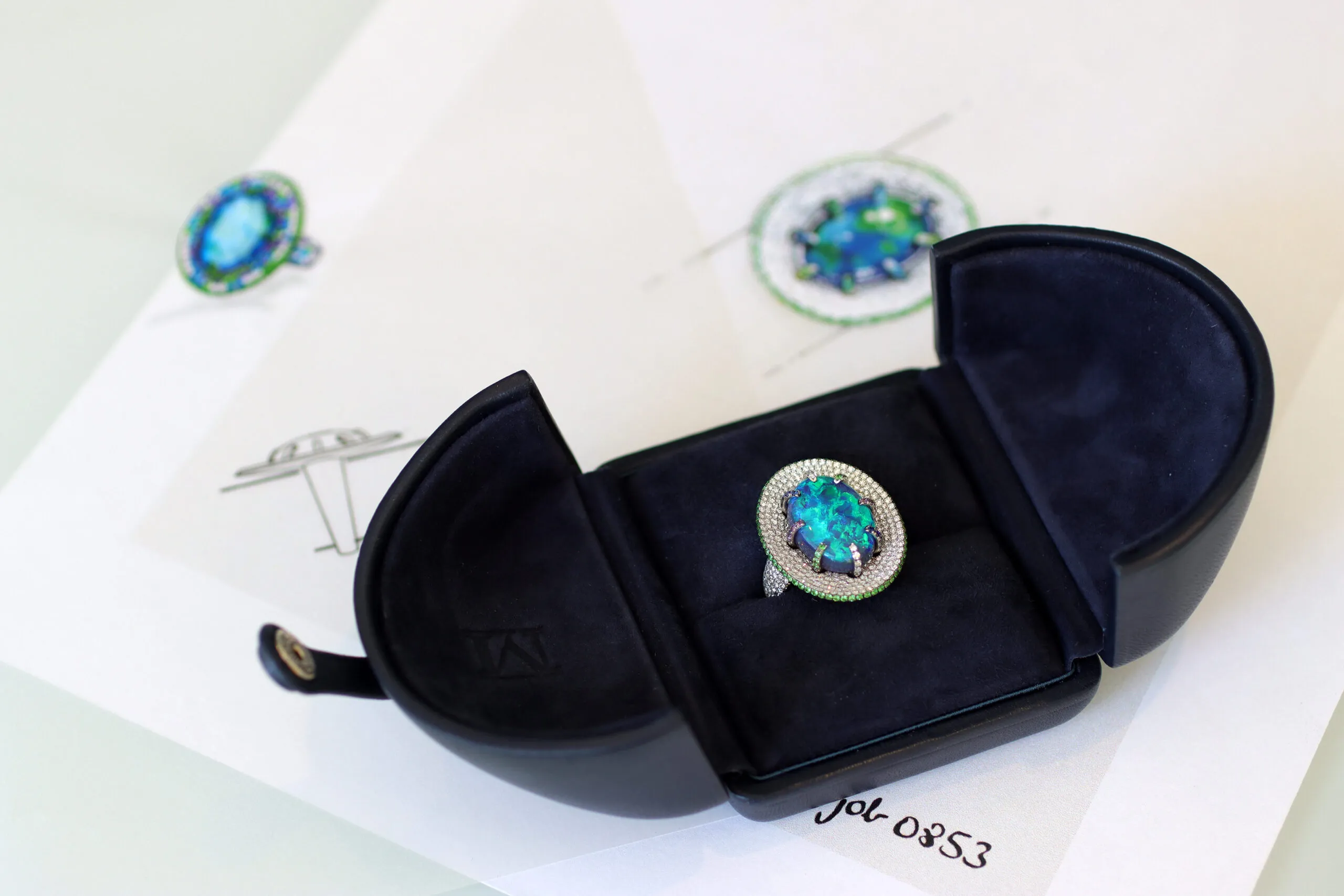 A closer look at a Martin Katz right-hand ring with a 10.50-carat black opal, micro-set with 580 diamonds, sapphires, amethysts and tsavorites 