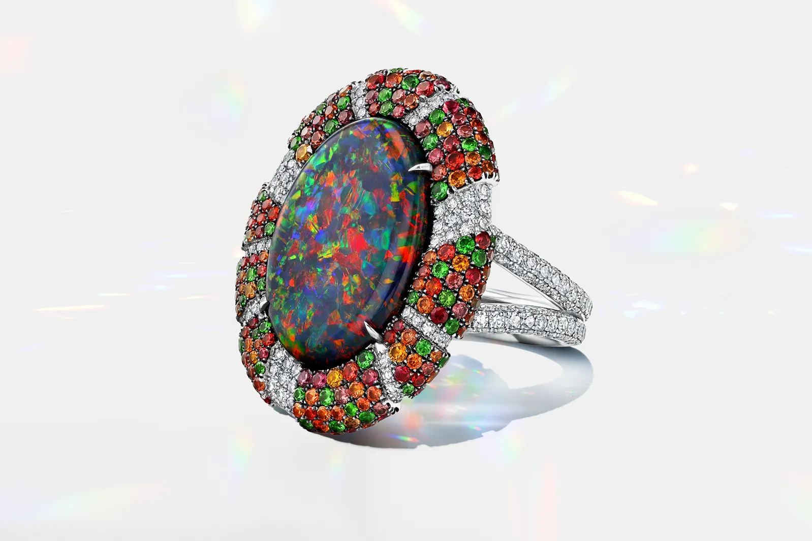 Martin Katz ring with a 6.80-carat oval-shaped Australian black opal, 257 micro-set diamonds, 187 sapphires and 66 tsavorite garnets, set in platinum ©martinkatzjewels