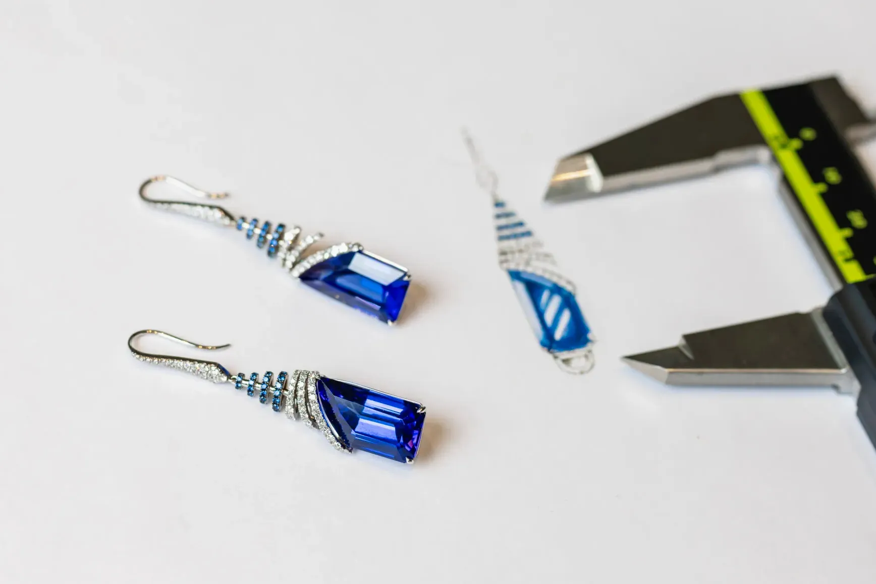 Martin Katz Tanzanite Drop earrings with 17.25 carats of tanzanites surrounded by 116 diamonds and 84 sapphires set in 18k white gold ©martinkatzjewels