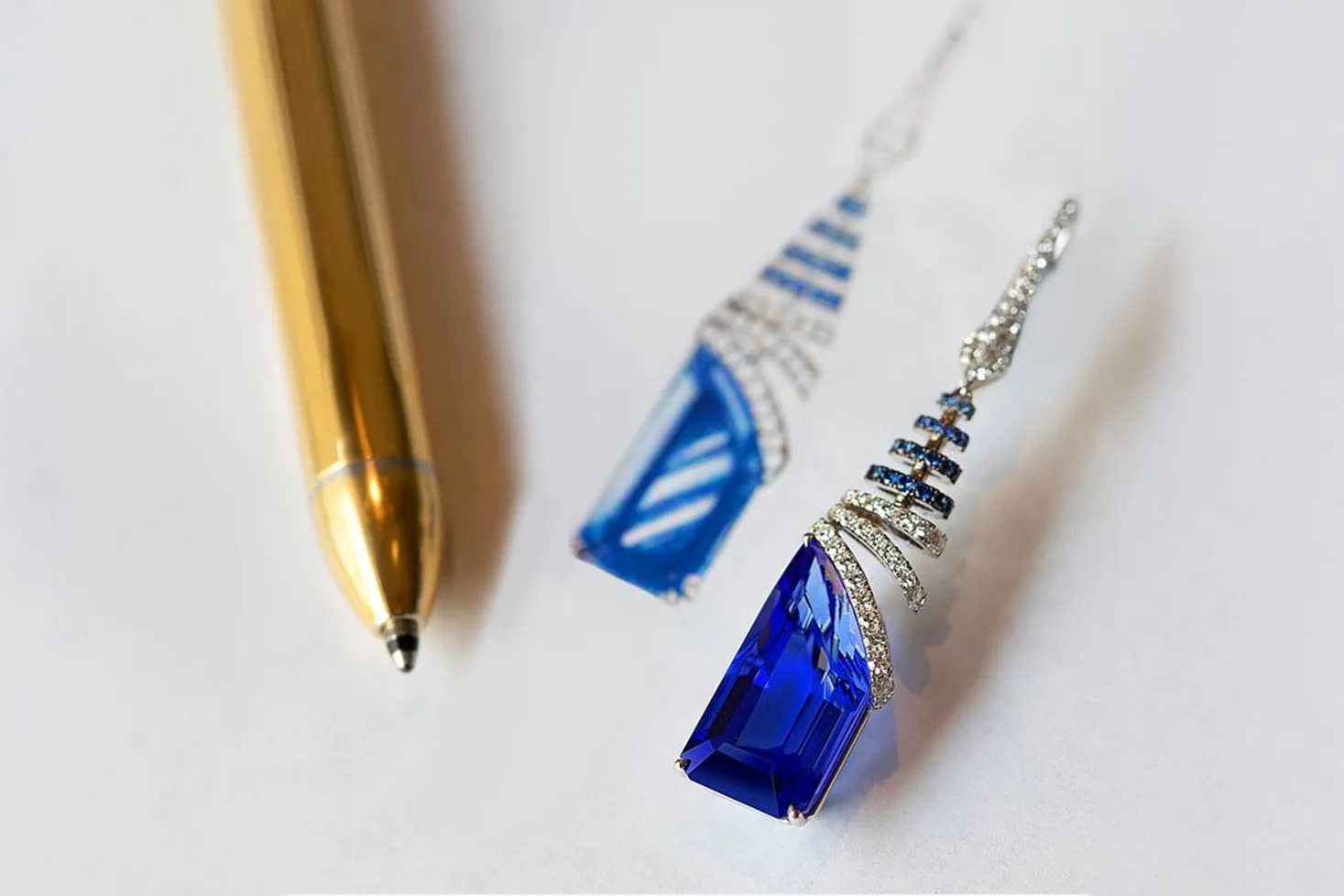 The design process behind a pair of Martin Katz Tanzanite Drop earrings with 17.25 carats of tanzanites surrounded by 116 diamonds and 84 sapphires set in 18k white gold ©martinkatzjewels
