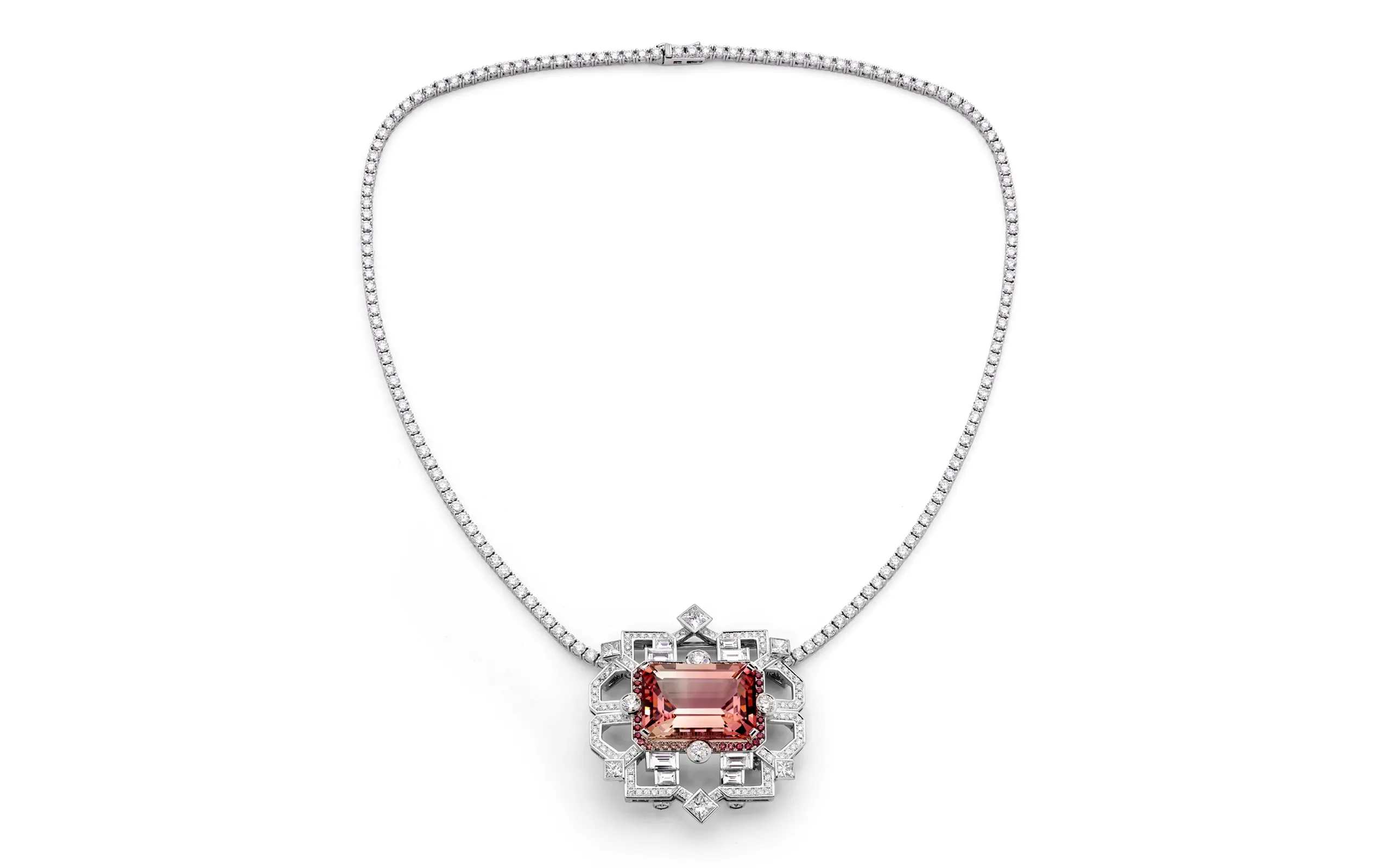 The final product - a transformable brooch-pendant by Matthew Ely with a 24.34 carat bi-colour tourmaline surrounded by colour fade sapphires and diamonds, set on a diamond line necklace in 18k white gold 