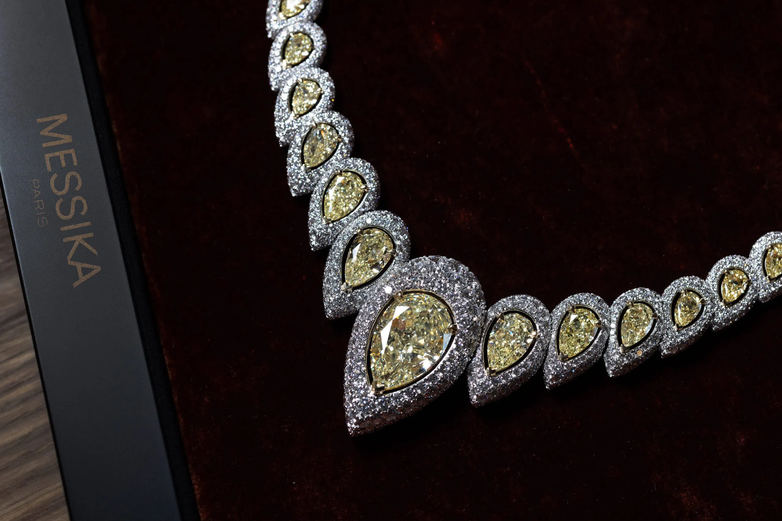 The Messika Incandescence necklace from the Terres d’Instinct High Jewellery collection features a 20.04-carat fancy yellow pear-shaped diamond surrounded by further yellow diamonds and white diamonds, set in 18k white gold 
