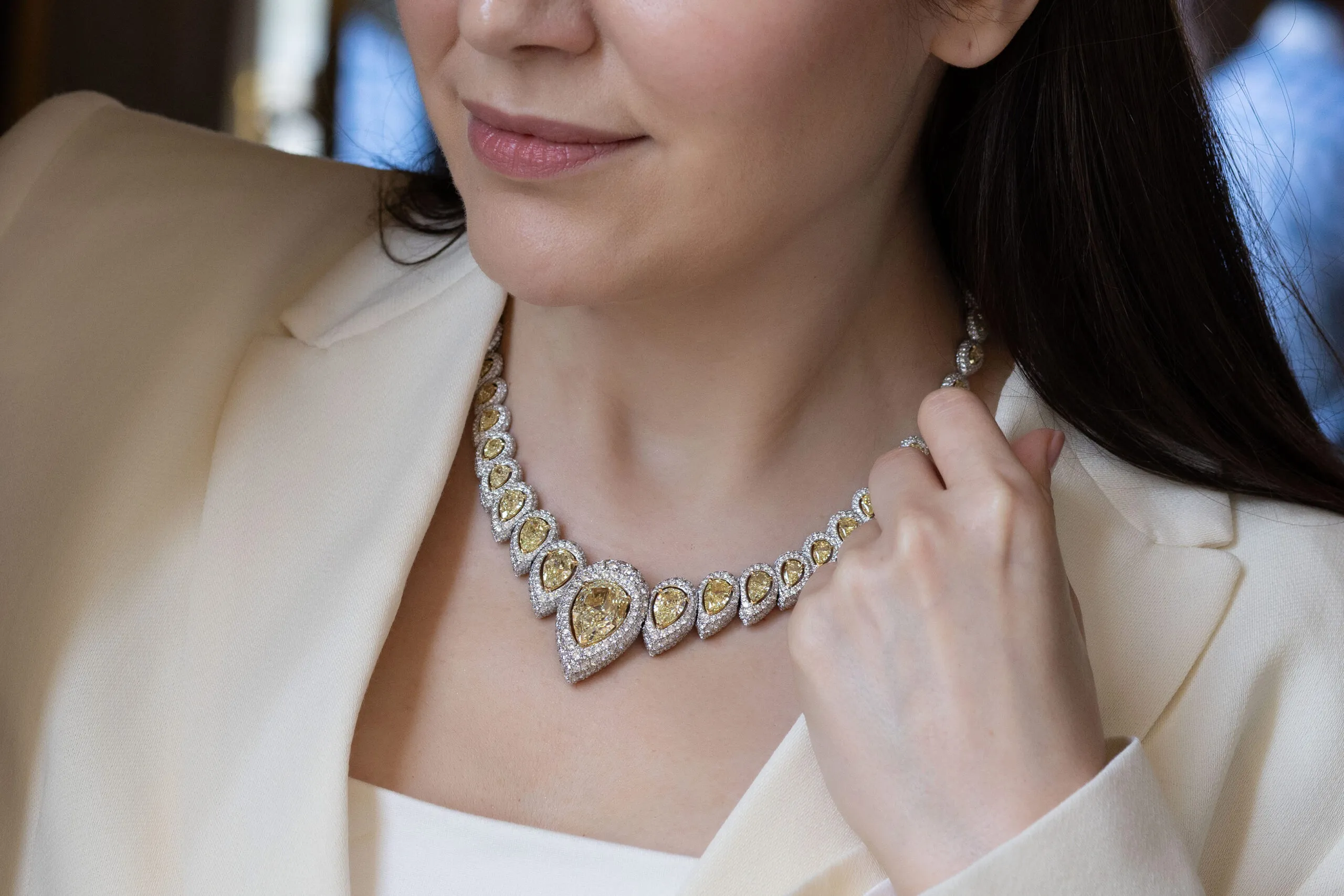 Katerina Perez wears the Messika Incandescence necklace with a fancy yellow pear-shaped diamond of 20.04 carats, surrounded by 37 yellow diamonds and white diamonds in 18k white gold, from the Terres d’Instinct High Jewellery collection