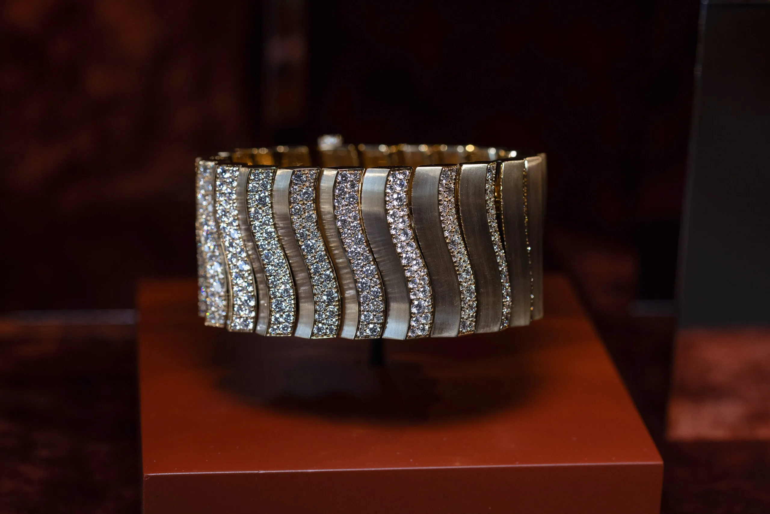 Messika Mirage cuff bracelet with white diamonds in 18k brushed yellow gold from the Terres d’Instinct High Jewellery collection