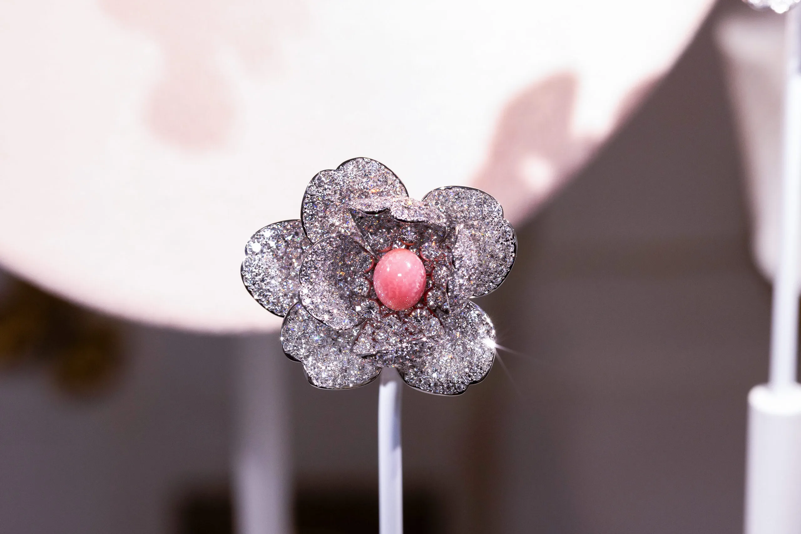 A conch pearl creation with 6.77 carats of diamonds from the Mikimoto Les Pétales High Jewellery collection, presented at Paris Haute Couture Week
