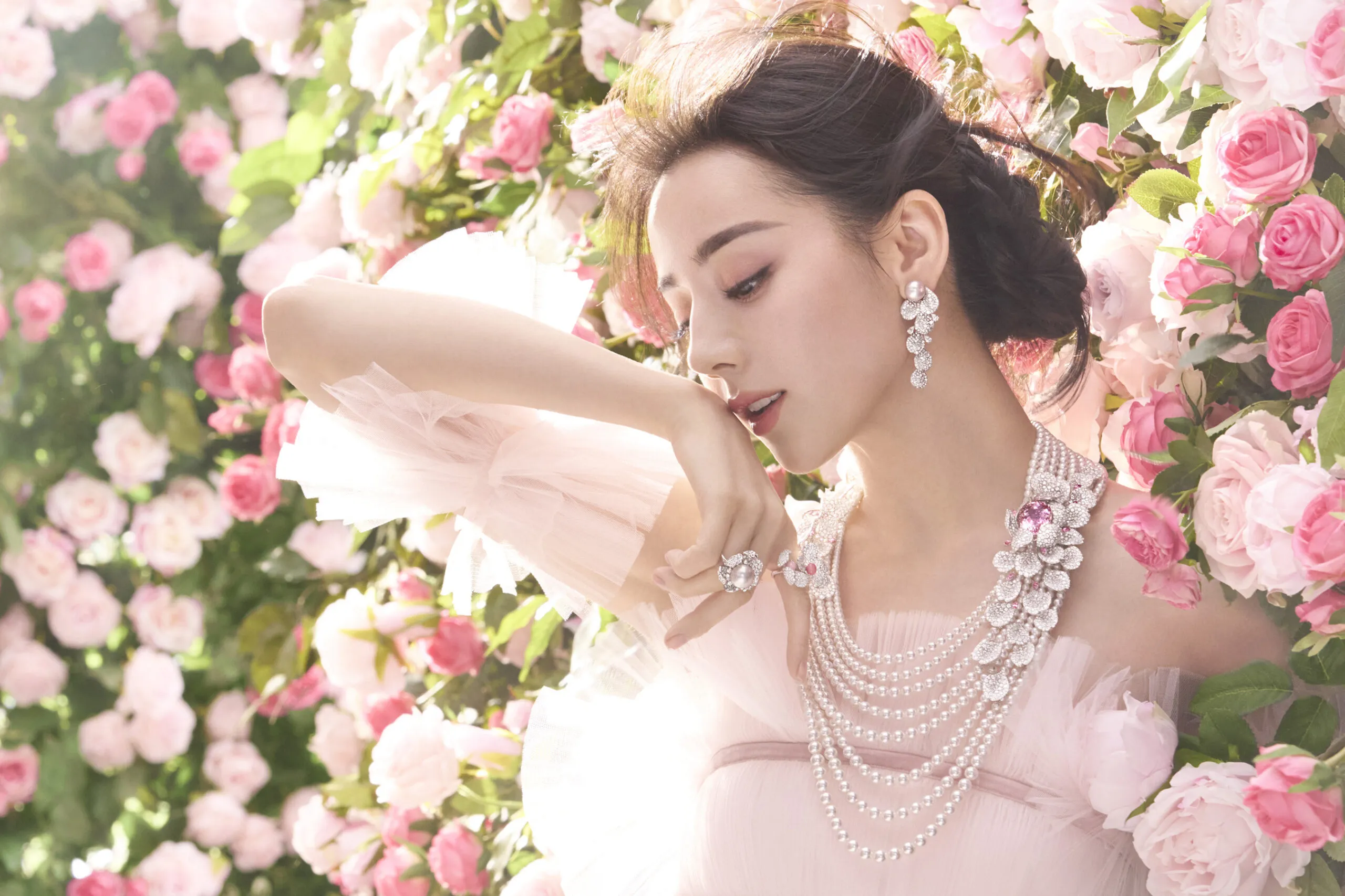 Mikimoto global brand ambassador Dilraba wears Les Pétales necklace in white gold, set with Akoya cultured pearls, morganite, tourmaline and diamonds