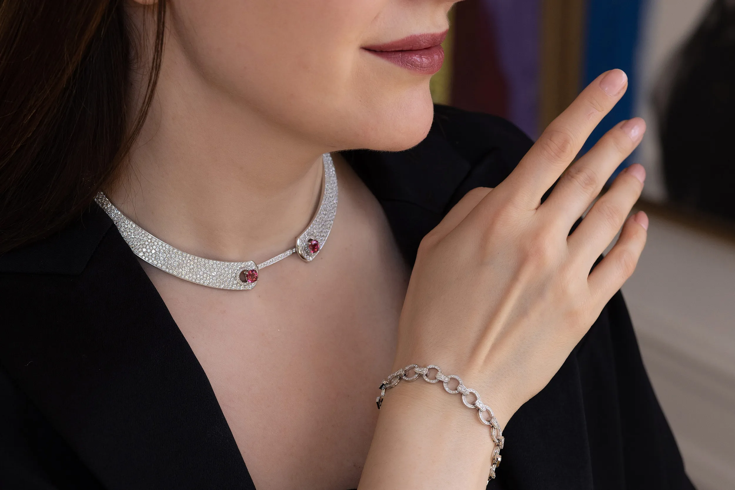 Katerina Perez wears the Nouvel Héritage Mood necklace with cushion-cut pink tourmalines and 856 snow-set diamonds, totalling nearly 18 carats, set in 18k white gold, alongside the removable chain that can be worn as a bracelet 