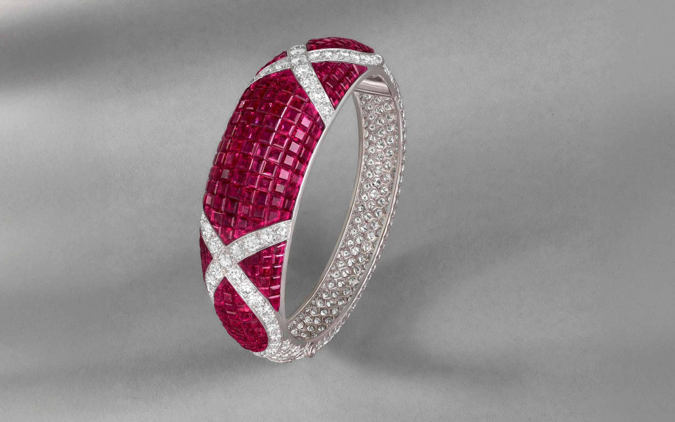 Van Cleef & Arpels Orsay bracelet with mystery-set rubies and diamonds in platinum and yellow gold (c. 1994), to be presented at TEFAF Maastricht 2025