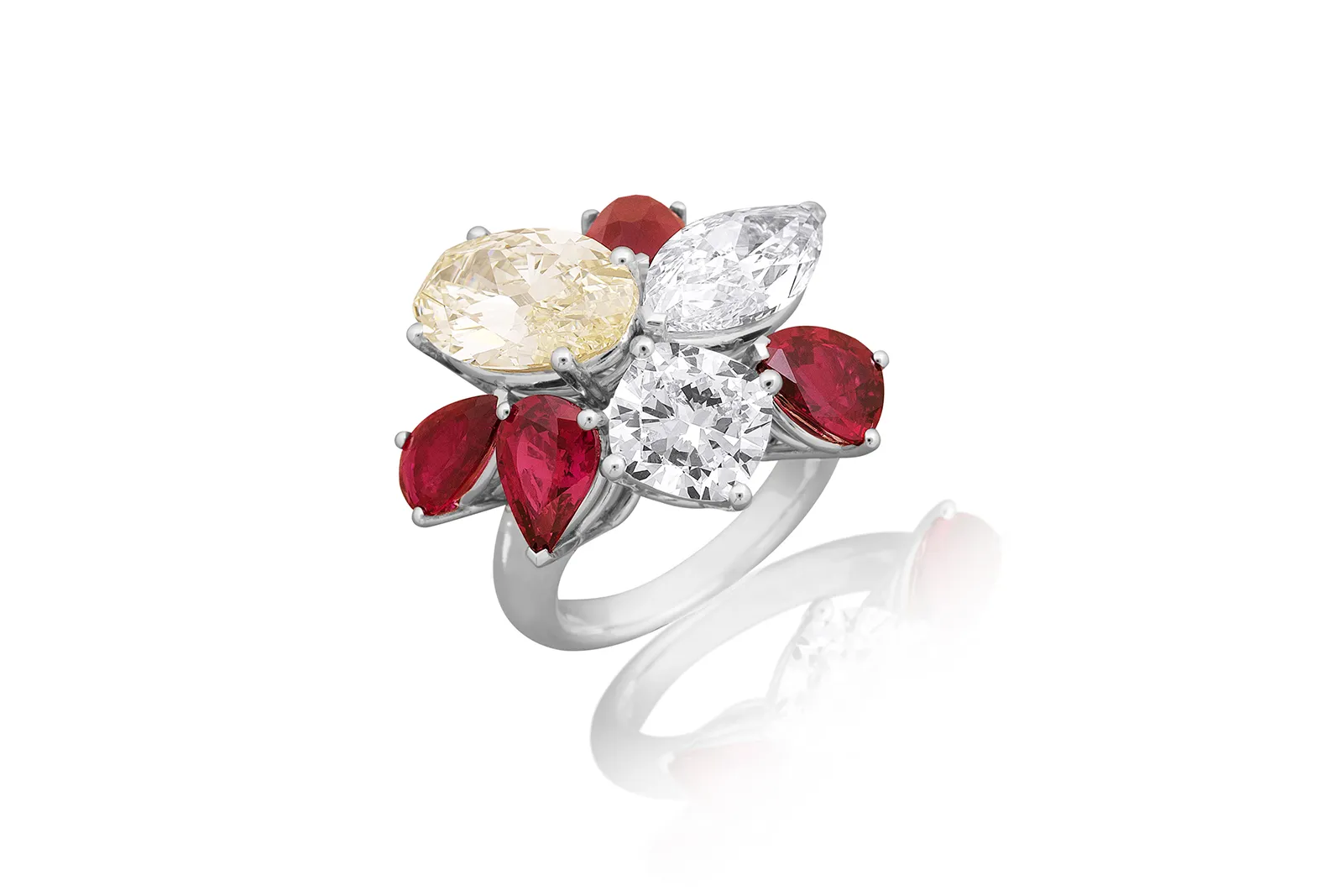 Picchiotti Burma Super Star ring from the Picchiotti Classics collection with an oval-shaped diamond of 4.43 carats, one marquise-shaped diamond of 3.19 carats, and a cushion-cut diamond of 2.34 carats, alongside Thai and Burmese rubies of nearly seven carats, set in 18k white gold 