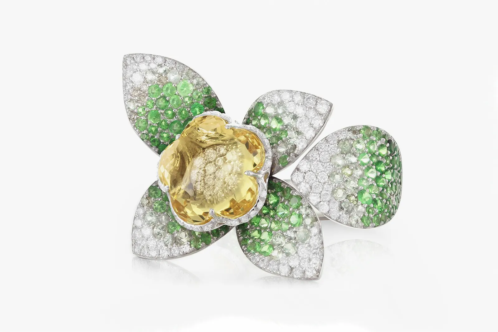 <p>Pasquale Bruni &#8216;Giardini Segreti&#8217; collection ring in white gold with heliodor flower, green sapphires, tsavorites, and diamonds</p>
