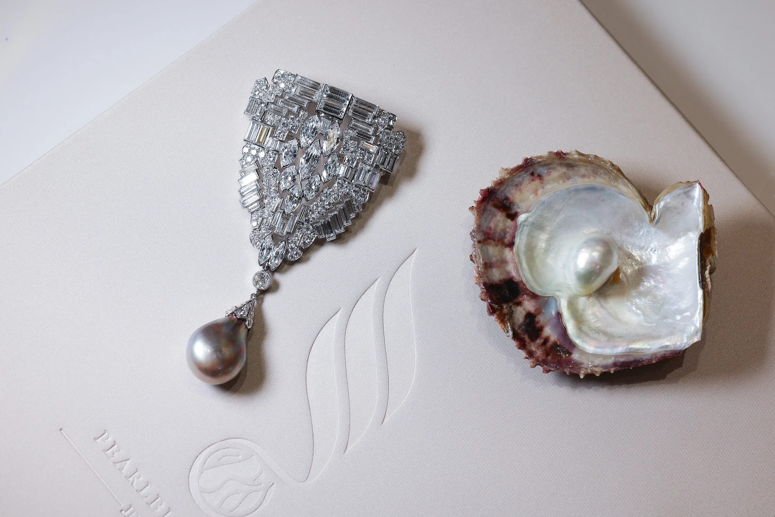 <p>A close up of the exquisite drop-shaped saltwater natural pearl at Pearl Biography</p>