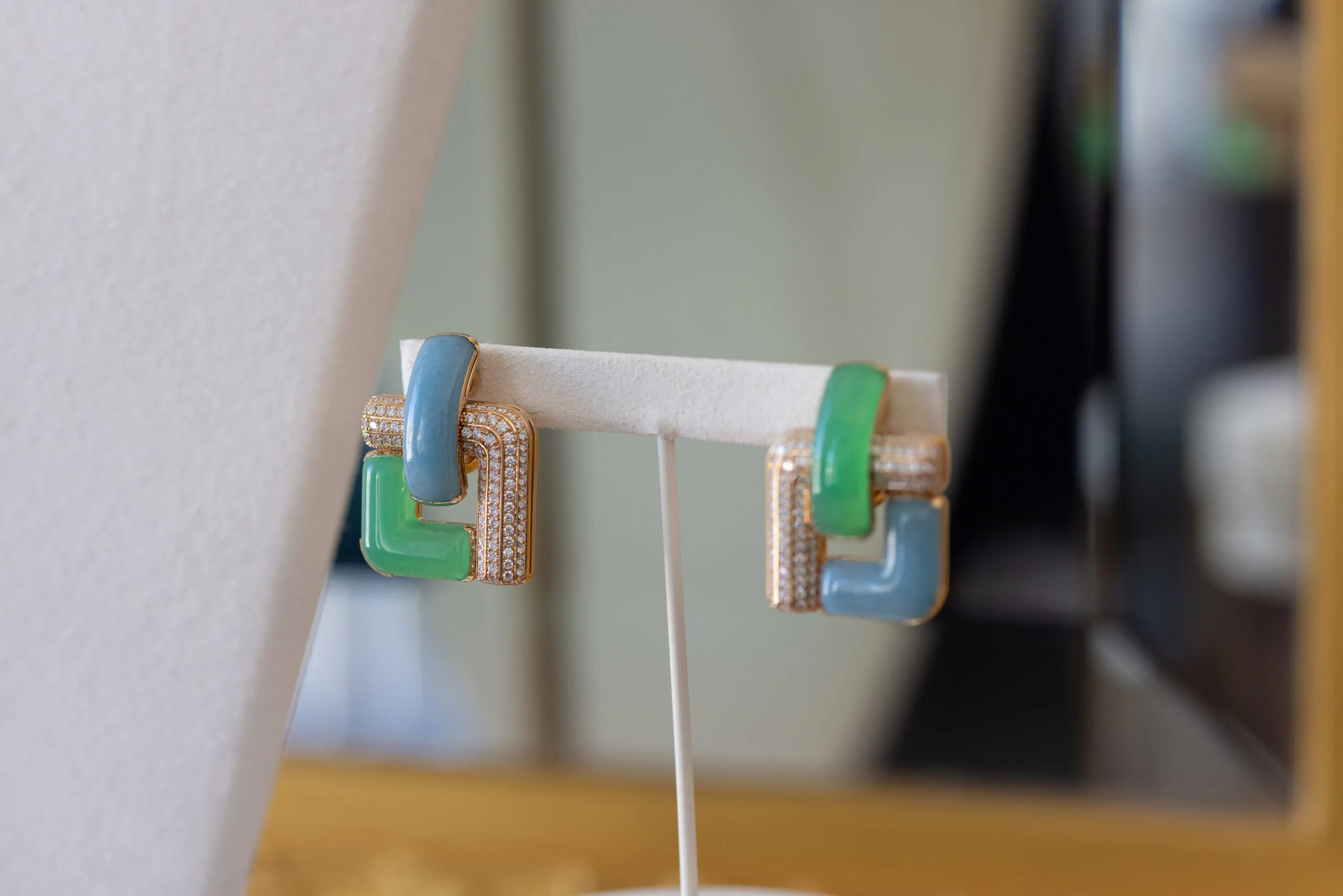The Curved Artistry earrings set with troilite, chrysoprase and diamonds in 18K rose gold