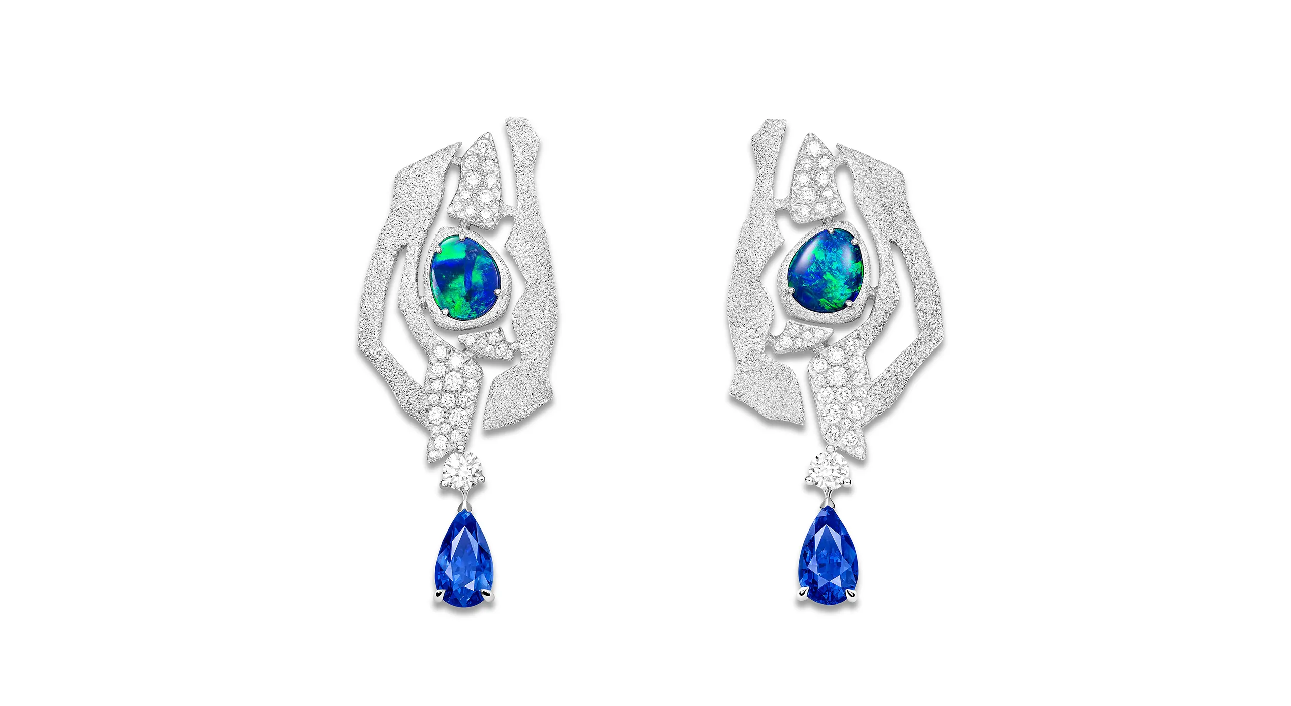 The Flowing Curves earrings, set with two pear shape Madagascan sapphires, black Australian opals and diamonds in 18K white gold