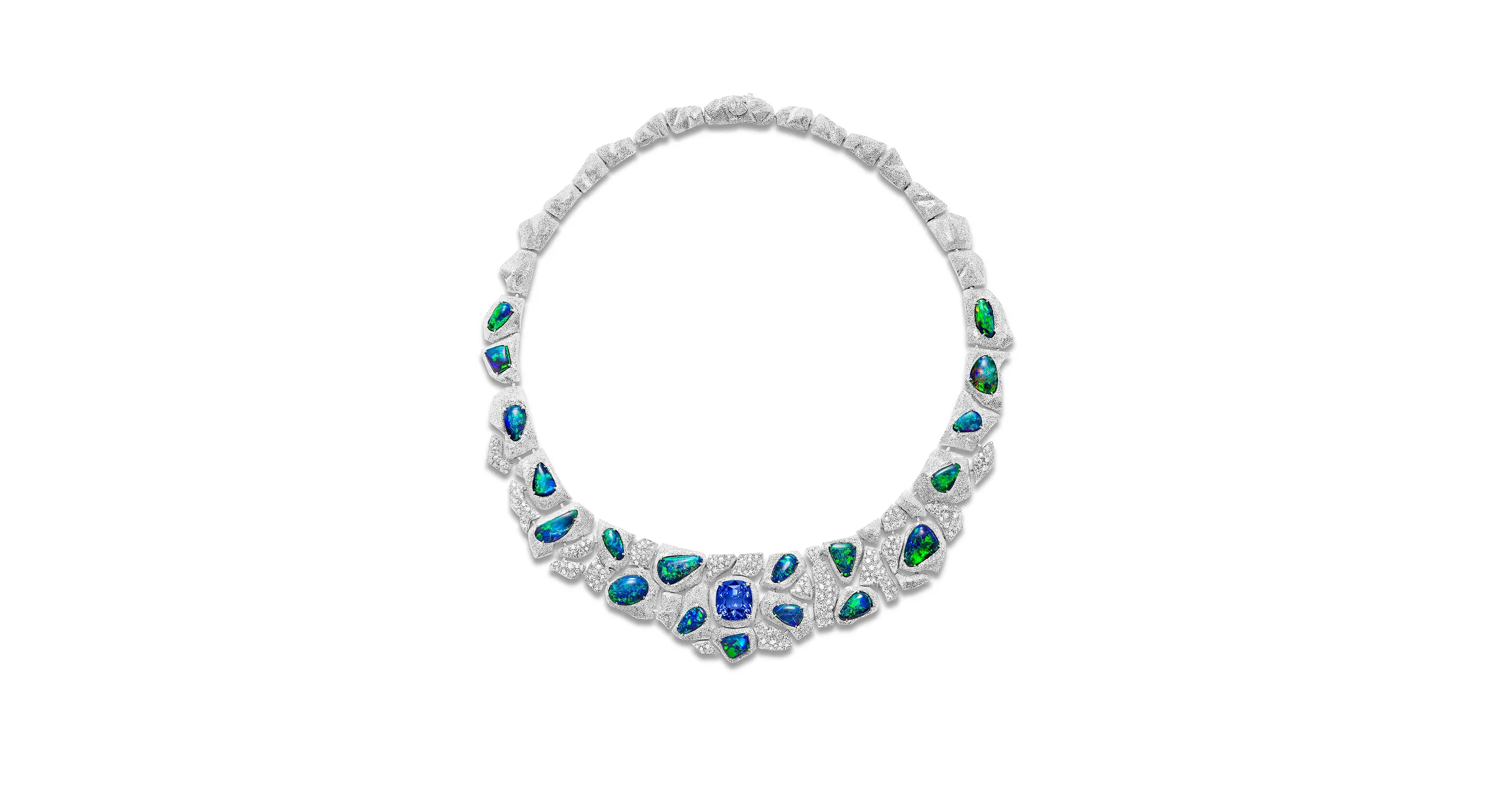 The design of the Flowing Curves suite, set with rare black Australian opals framed by cascades of diamonds, echoes the motion of water