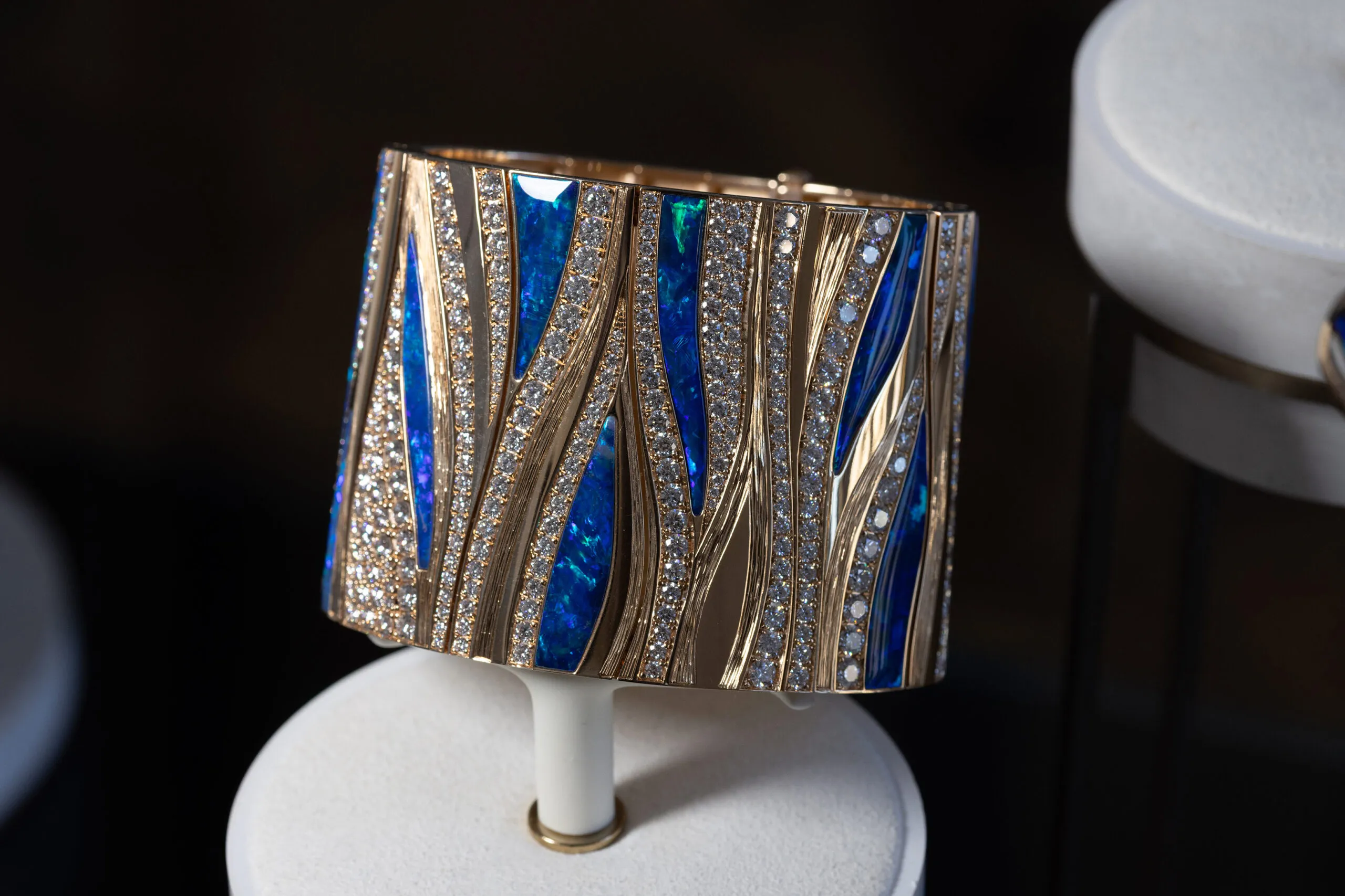 A new cuff bracelet from Piaget's Shapes of Extraleganza high jewellery collection set with opals, Yves Piaget's favourite stone