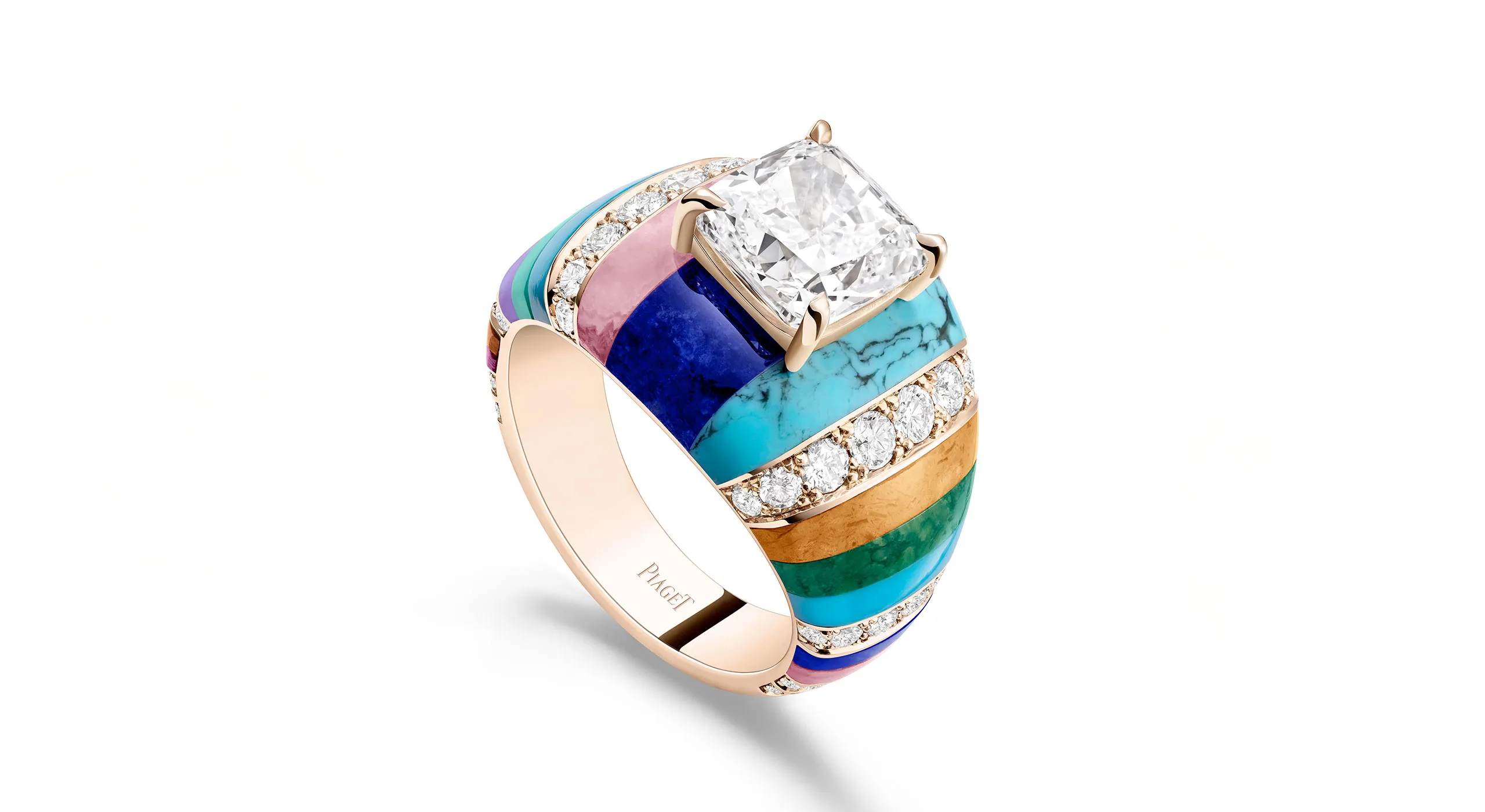 Kaleidoscope Lights high jewellery ring, set with a 3.02 carat cushion cut diamond, jasper, verdite, turquoise, sodalite, sugilite, chrysoprase, rhodochrosite, ruby root,
rhodonite and diamonds in 18K rose gold