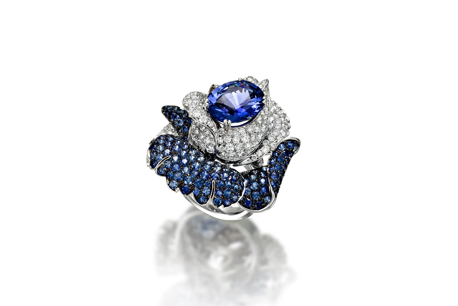 Picchiotti Fine Jewellery Rose ring with a 9.45 carat oval-shaped Sri Lankan sapphire, 6.63 carats of blue sapphires and 5.97 carats of round brilliant-cut diamonds set in 18k white gold 